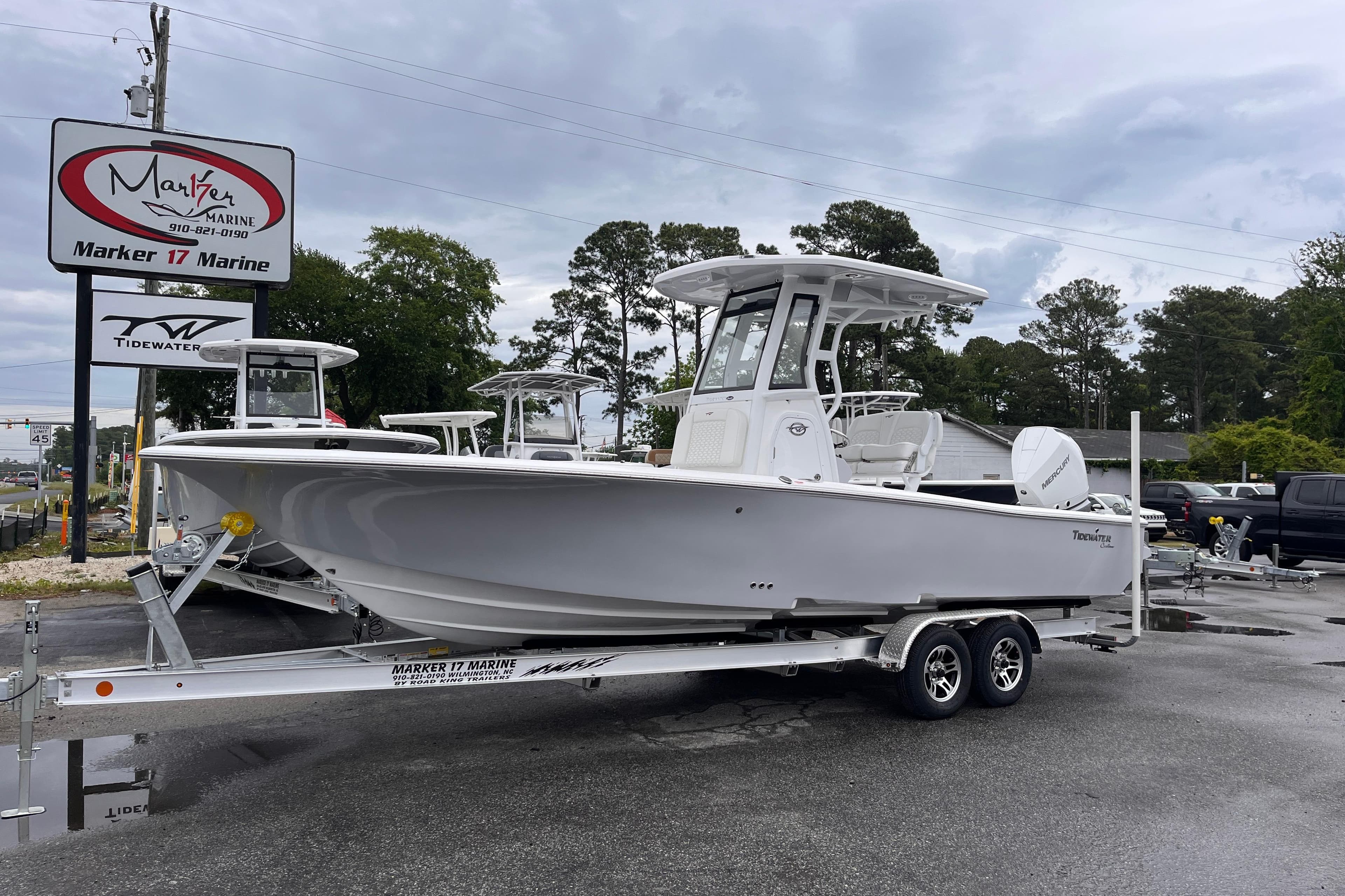 2026 Tidewater 2500 Carolina Bay boat on trailer at Marker 17 Marine dealership.