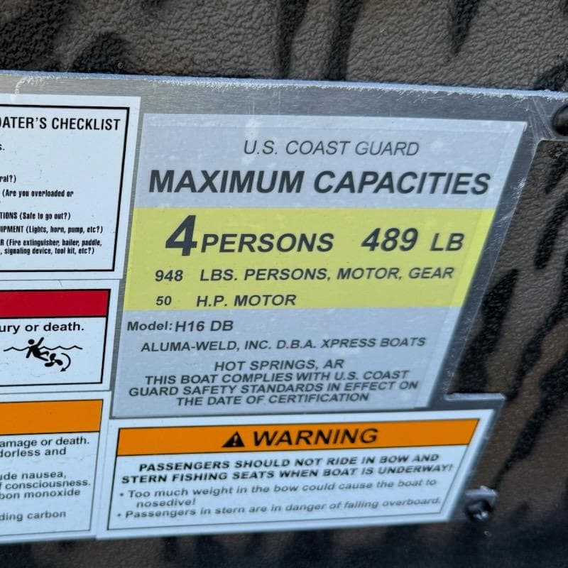 2025 Xpress H16DB boat capacity label, 4 persons, 489 lbs, 50 HP motor.