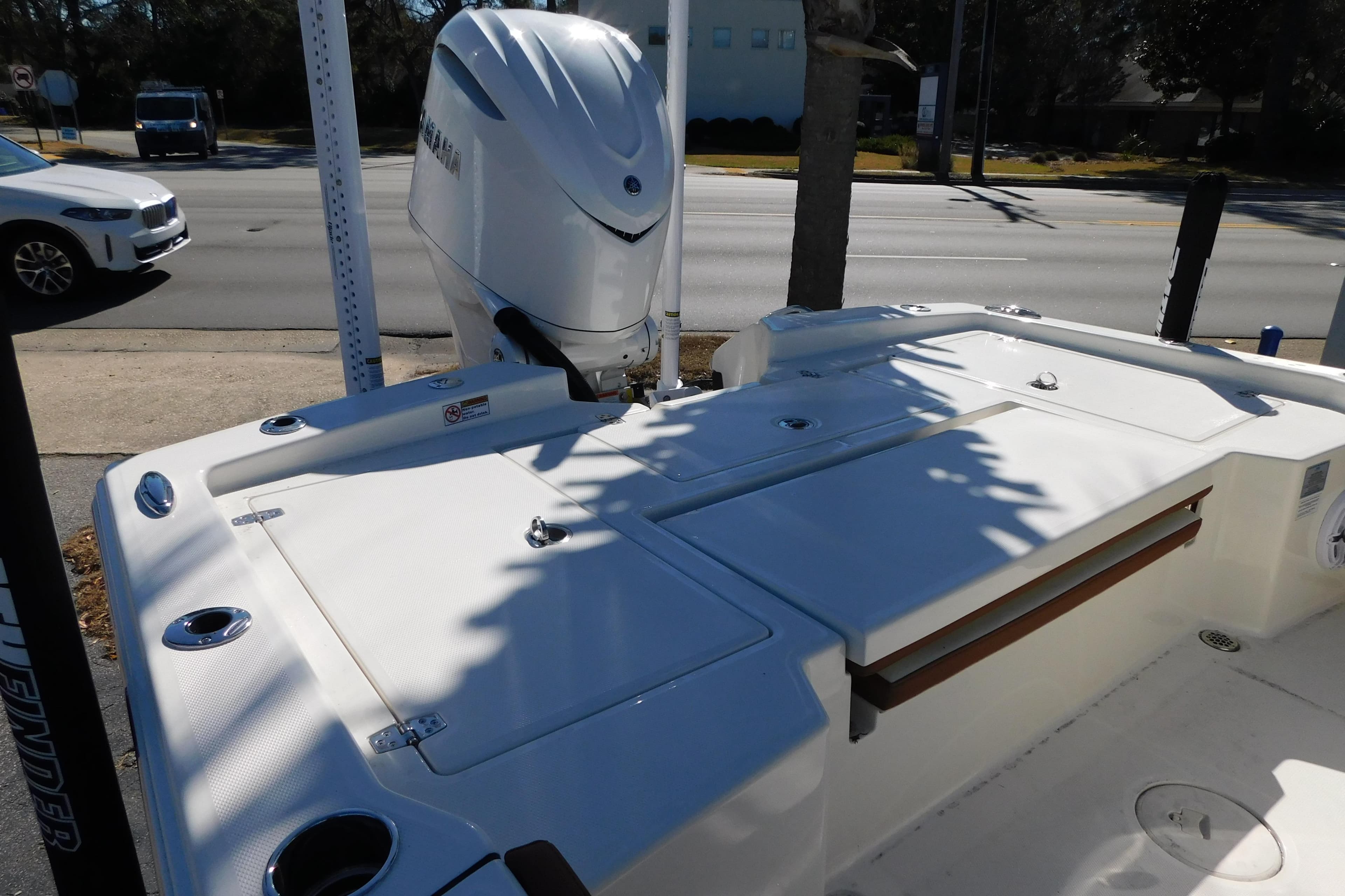2026 Pathfinder 2600 TRS boat with Yamaha outboard engine, parked on roadside.