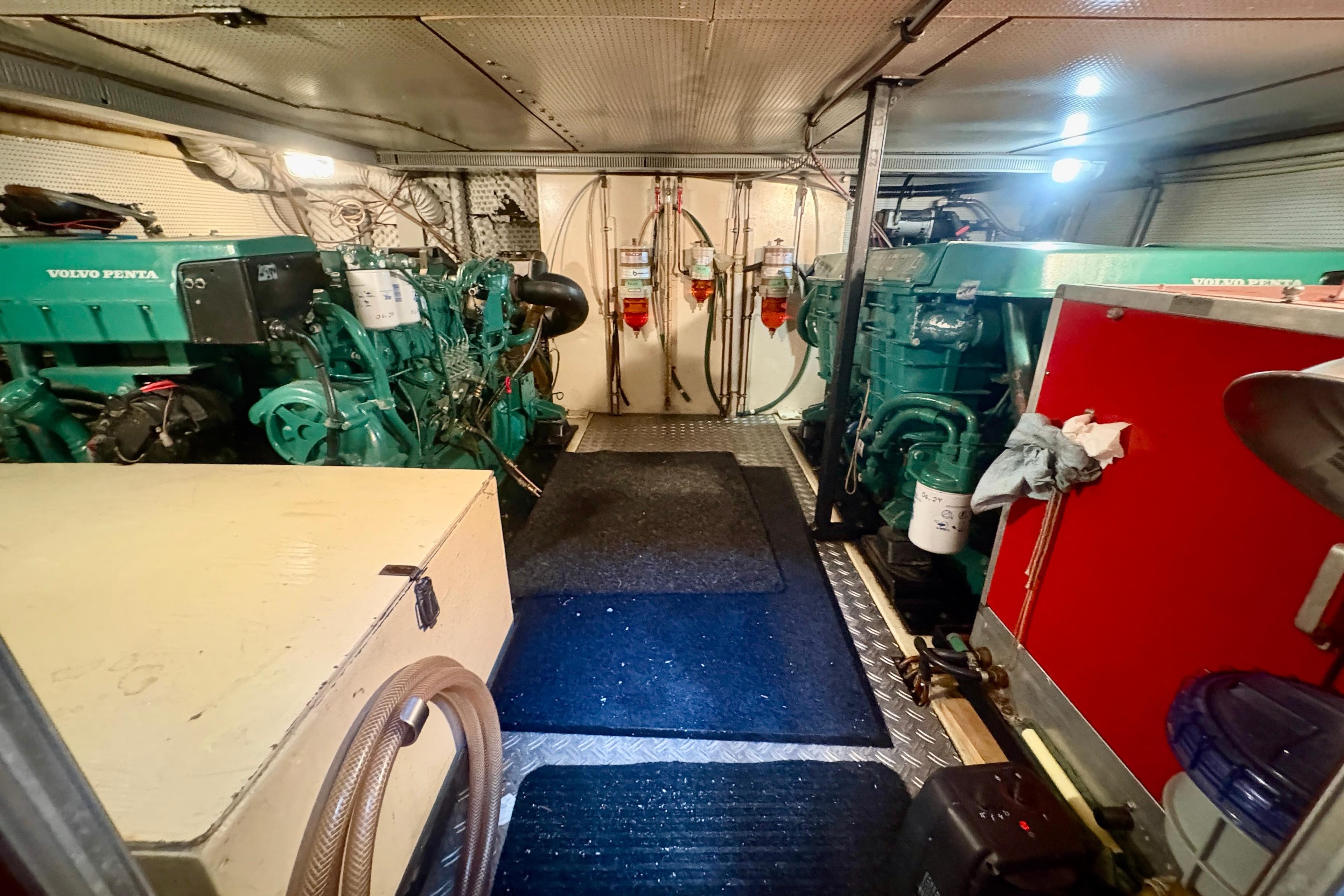 Engine room of 1990 Neptunus 145 AC yacht with Volvo Penta engines.