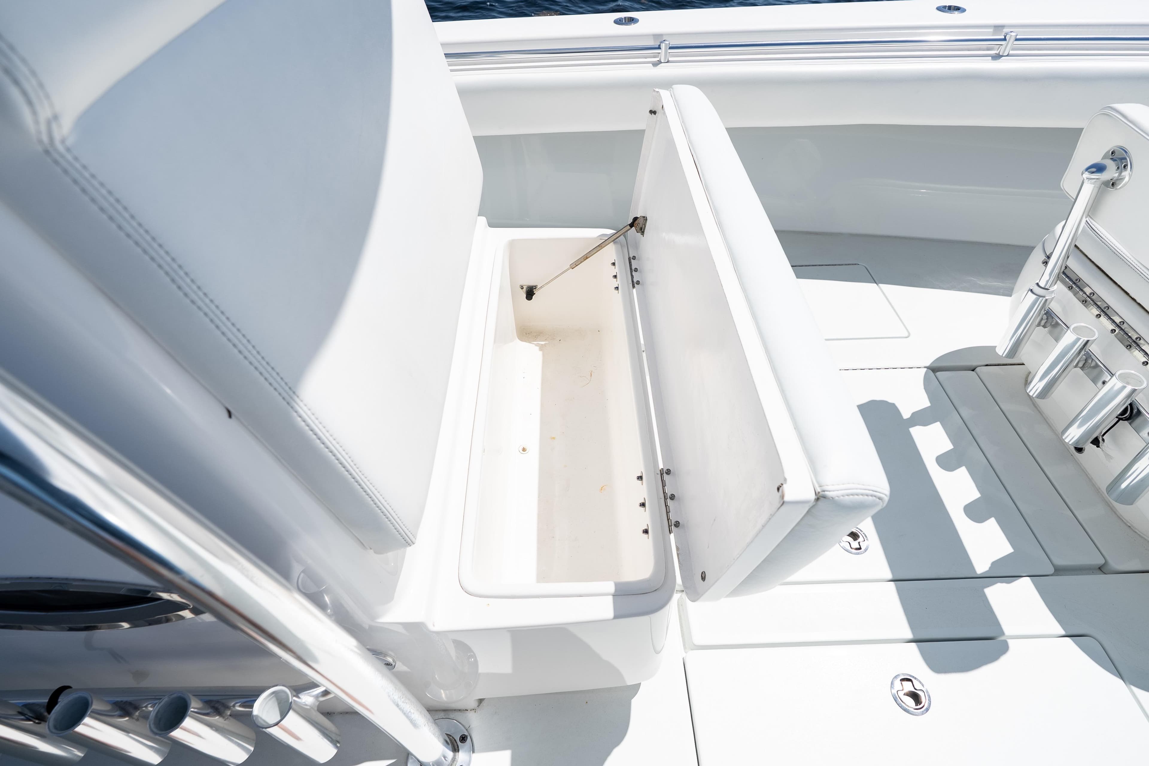 2022 Contender 35 ST boat with open storage compartment on deck.