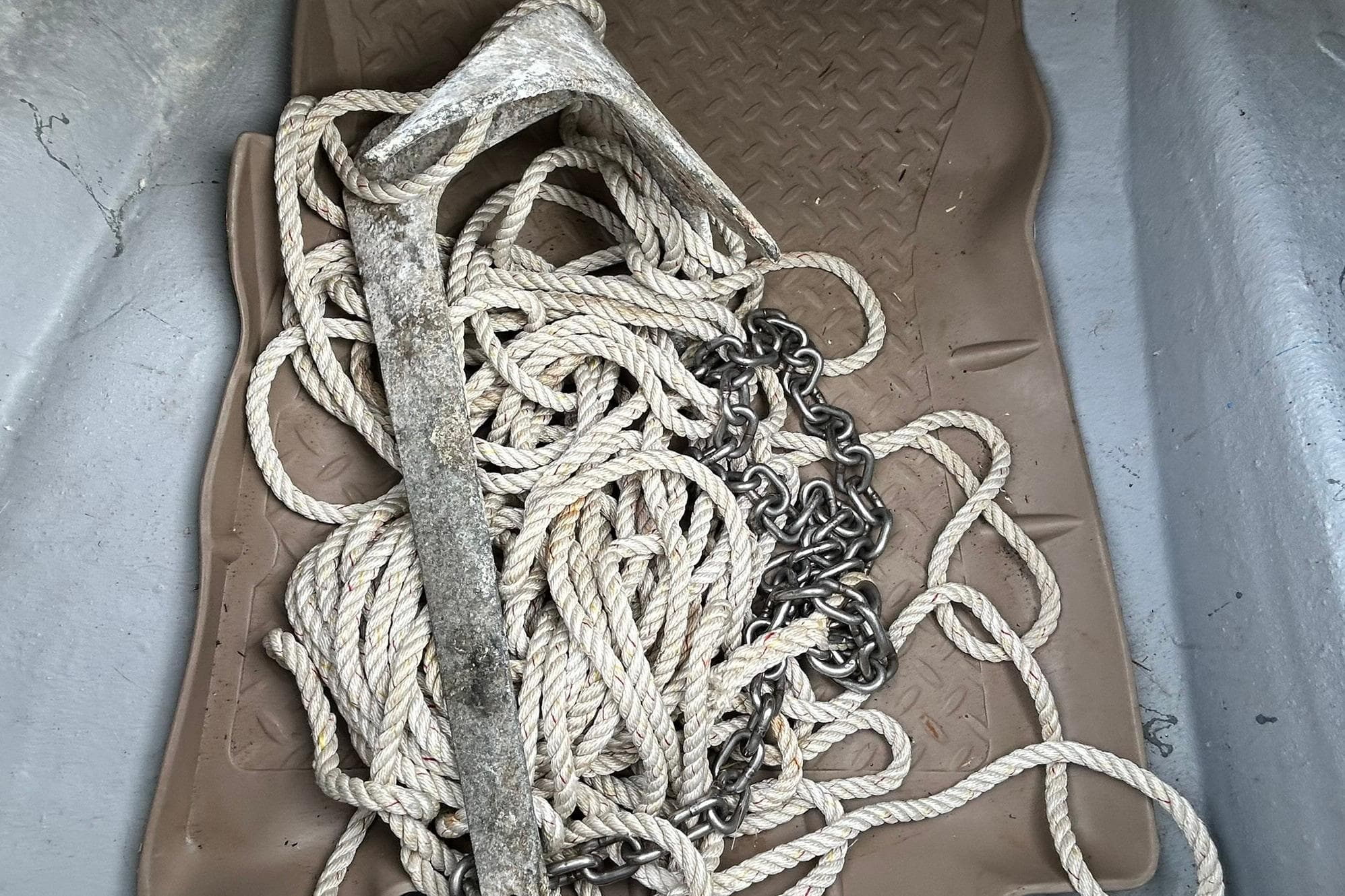 Anchor with rope and chain on a Transcat 200 SVT boat, 2022 model.