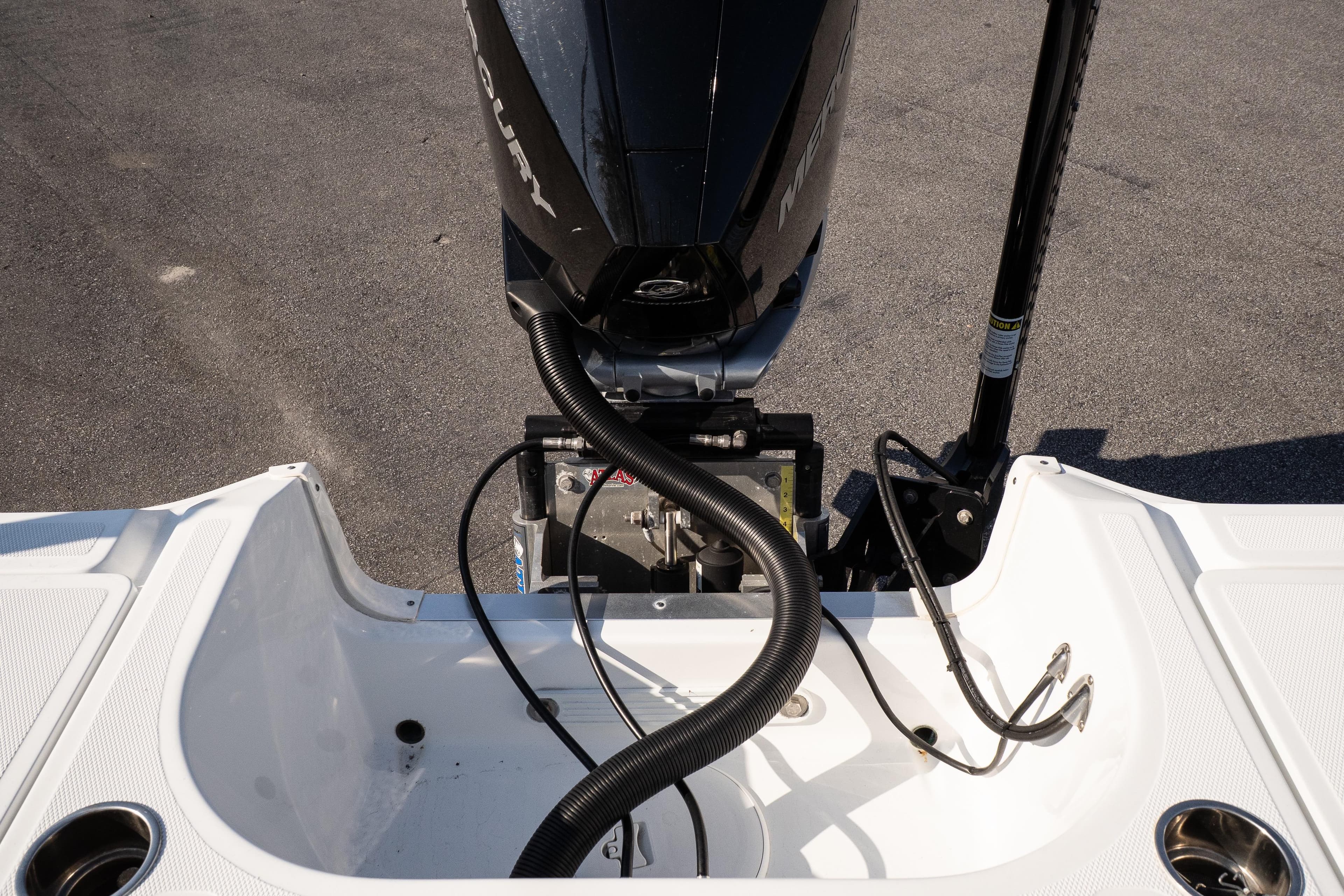 2022 Wellcraft 241 Bay boat engine and deck, showcasing modern design and functionality.