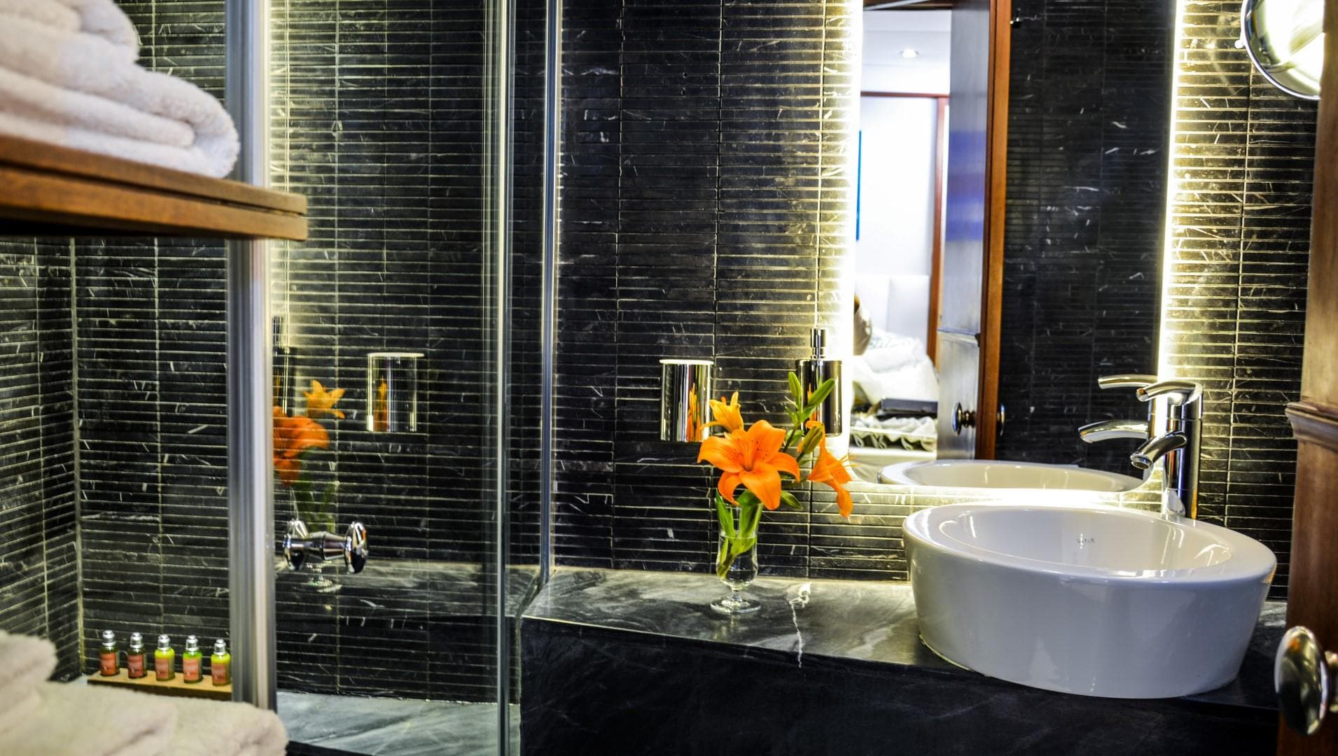 Luxurious bathroom on 2007 Custom 34m Steel Hull Gulet with modern sink and elegant decor.