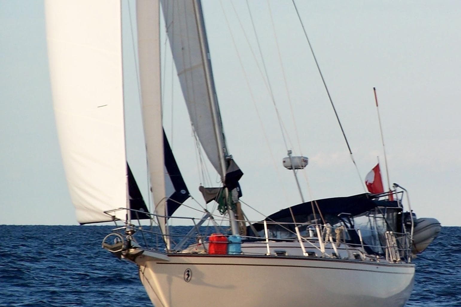 Sailing yacht Island Packet 37, 1995 model, cruising on open sea.