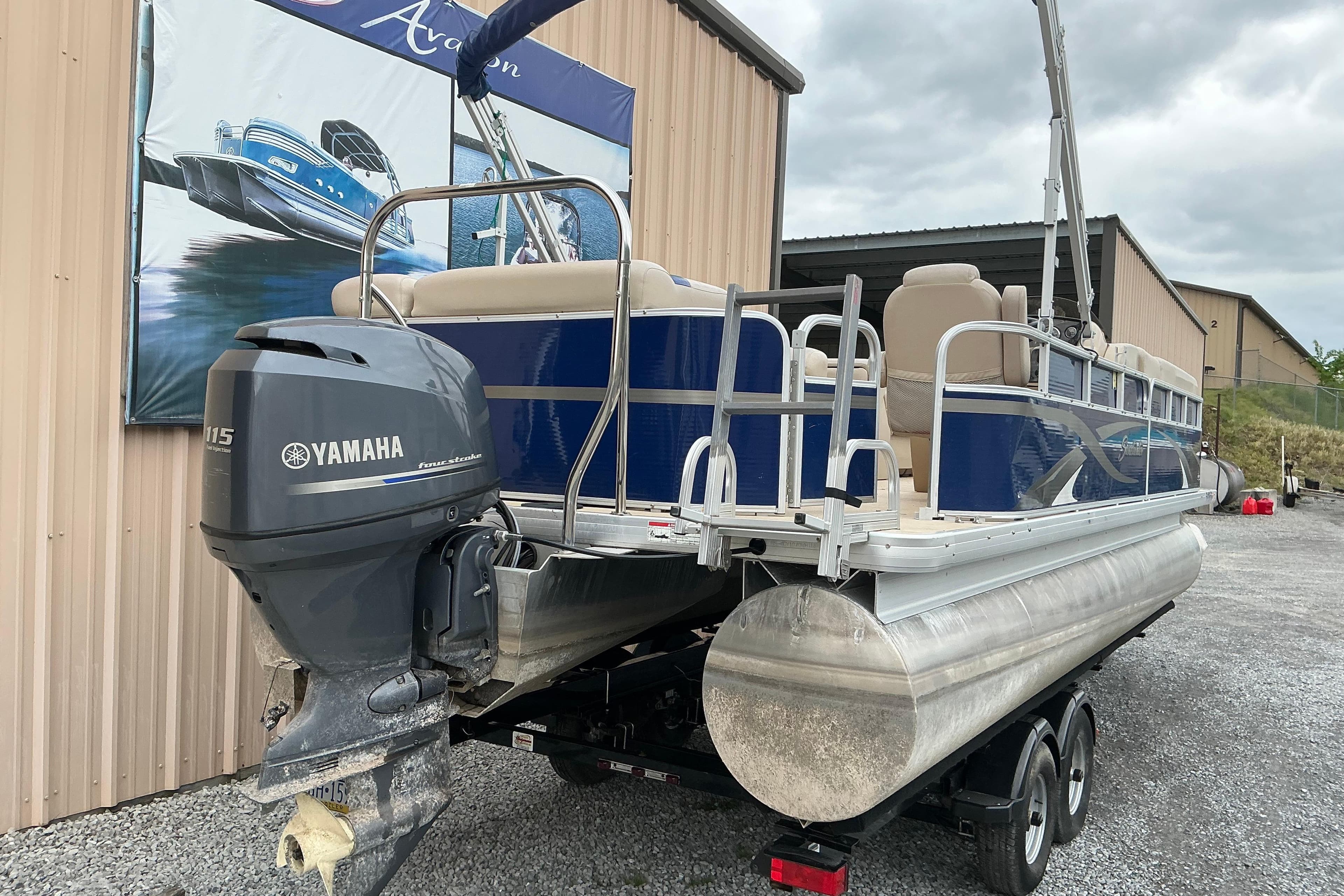 2012 Godfrey Sweetwater 2486 C pontoon boat with Yamaha outboard motor on trailer.