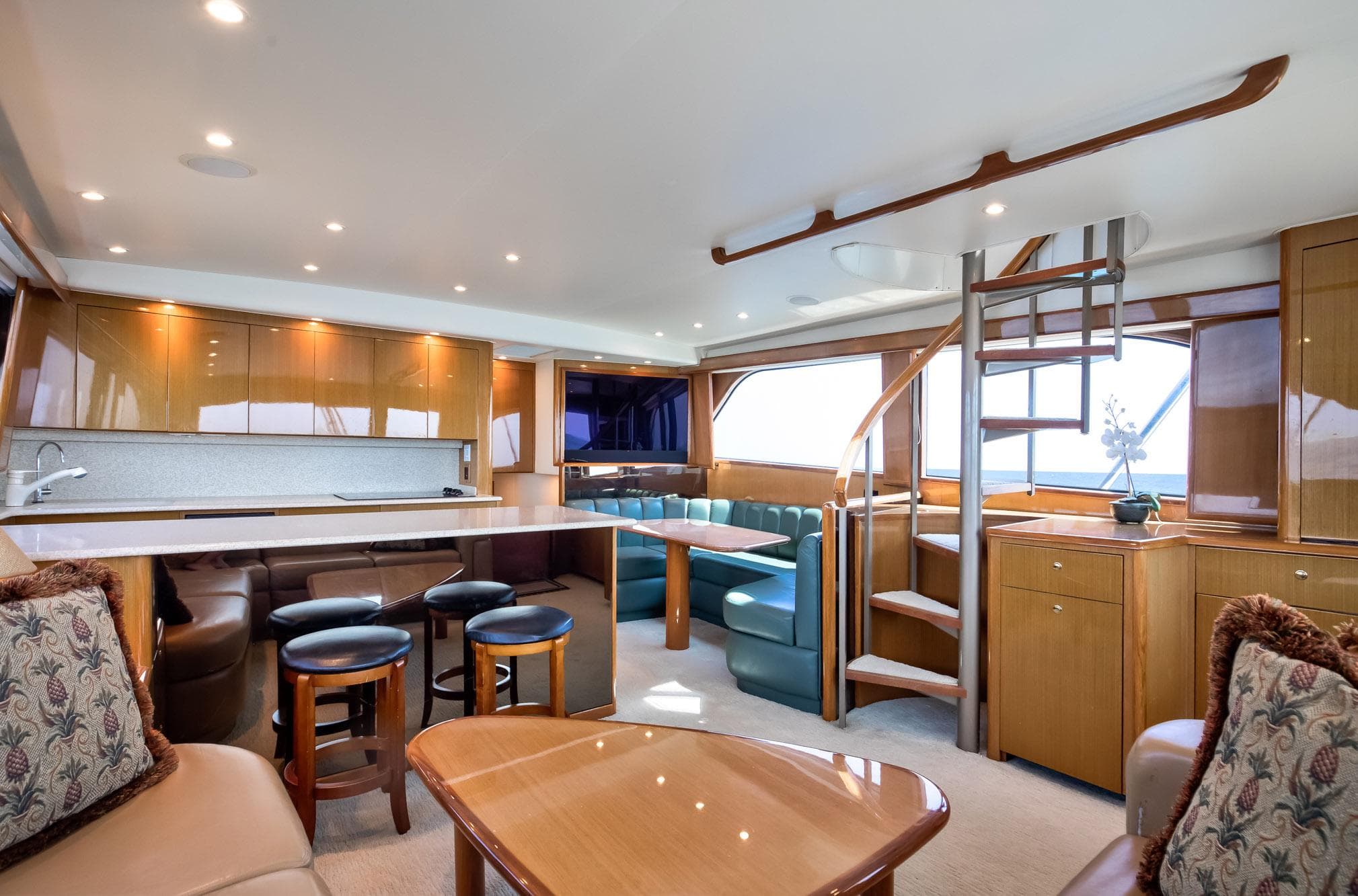 Luxurious interior of 2002 Viking 61 yacht with modern furnishings and elegant design.