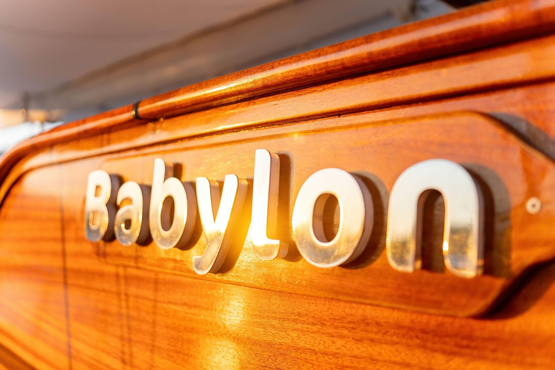 Custom 134 boat named Babylon, 2015, with polished wooden finish.