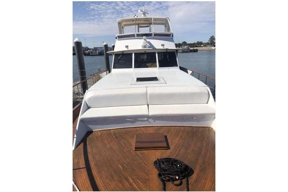 1974 Pacemaker Cockpit Motoryacht on water, showcasing deck and cabin.