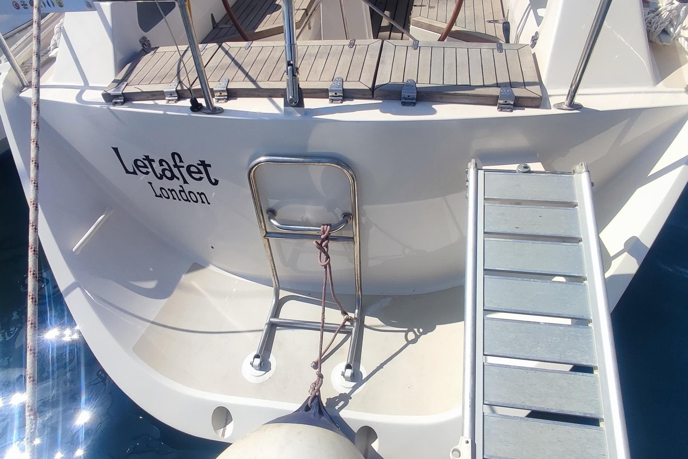 Custom Danish 44 yacht, 1987, docked with ladder and gangway, named Letafet, London.