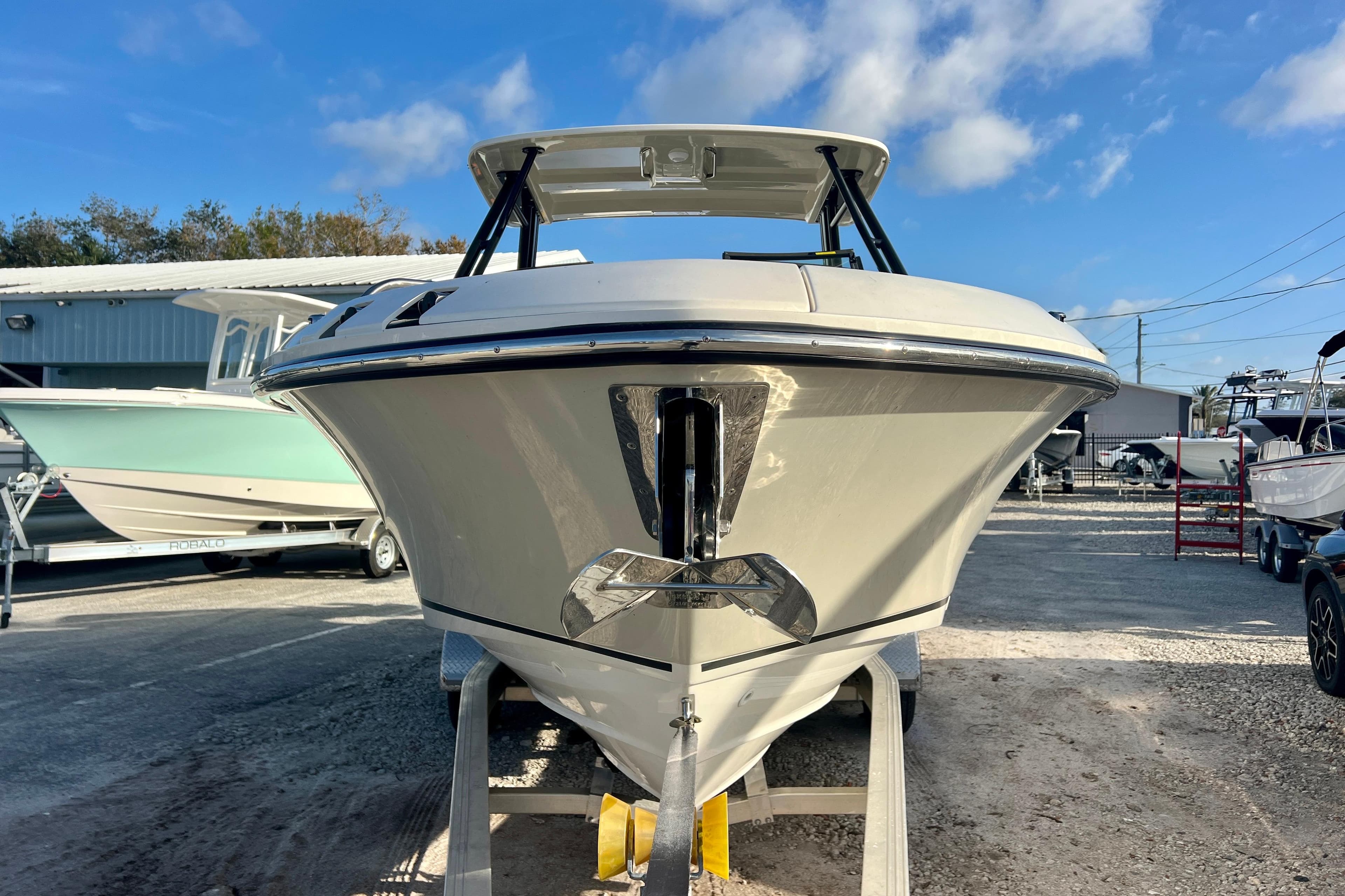 2025 Boston Whaler 240 Vantage boat on a trailer.