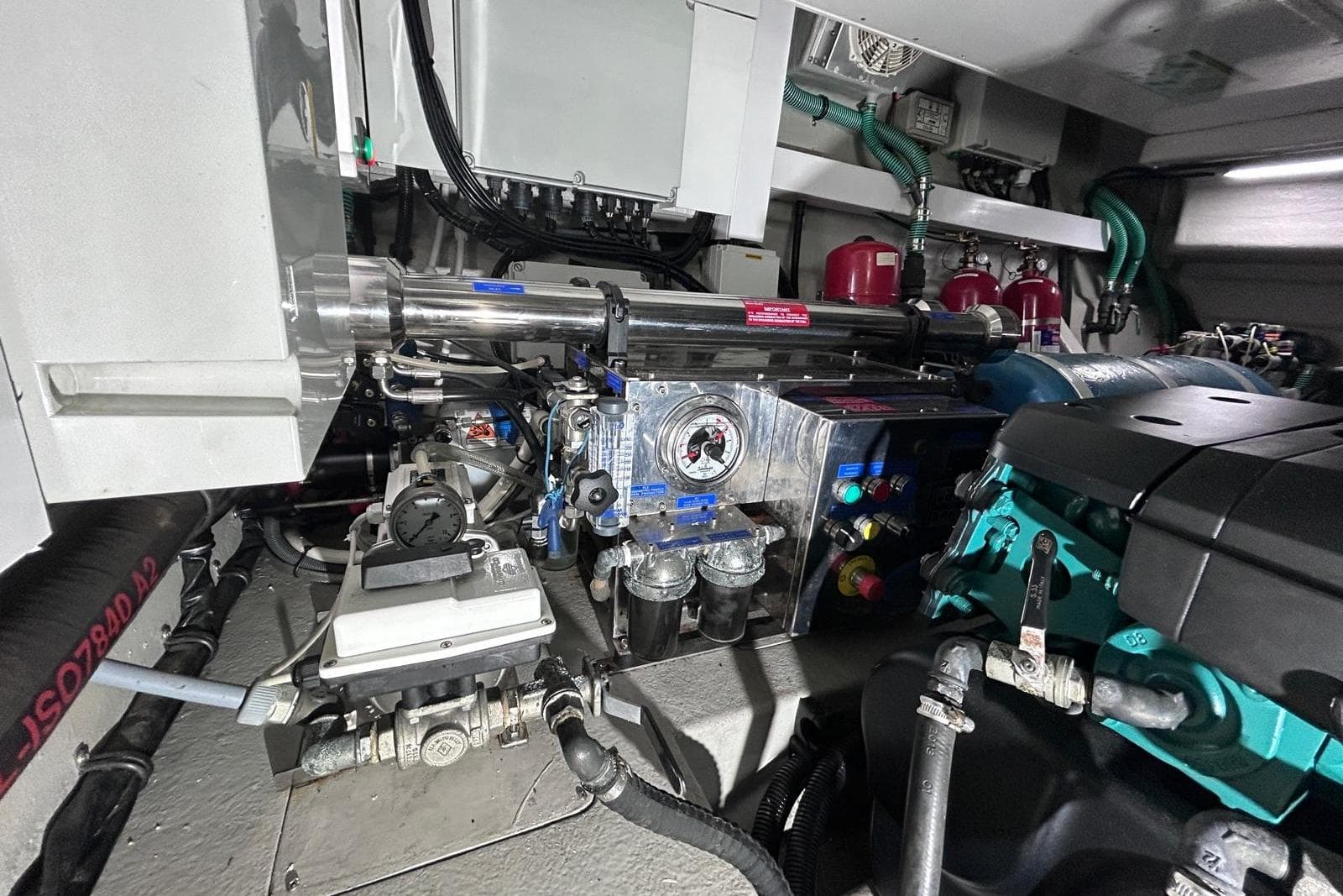 Engine room of 2014 Sunseeker San Remo 485 yacht, showcasing mechanical components and systems.