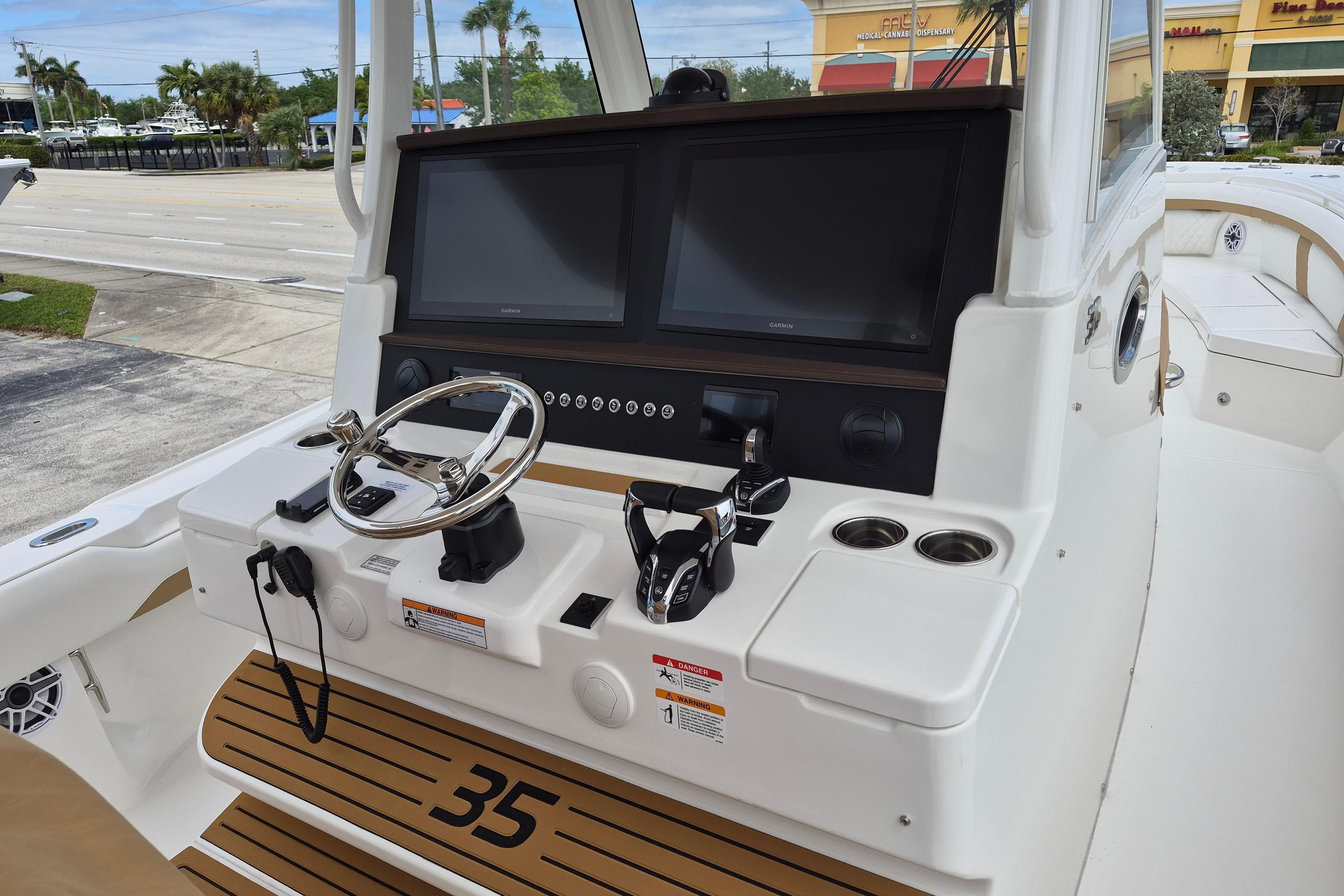 Regulator 35 boat console 2026 with steering and screens.