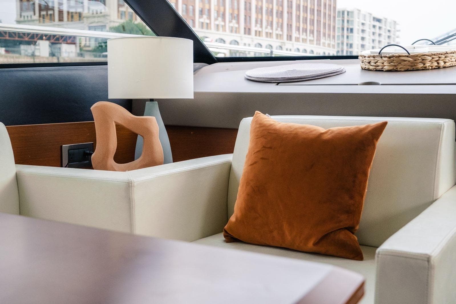 Luxurious interior of 2015 Prestige 500 yacht with modern decor and plush seating.