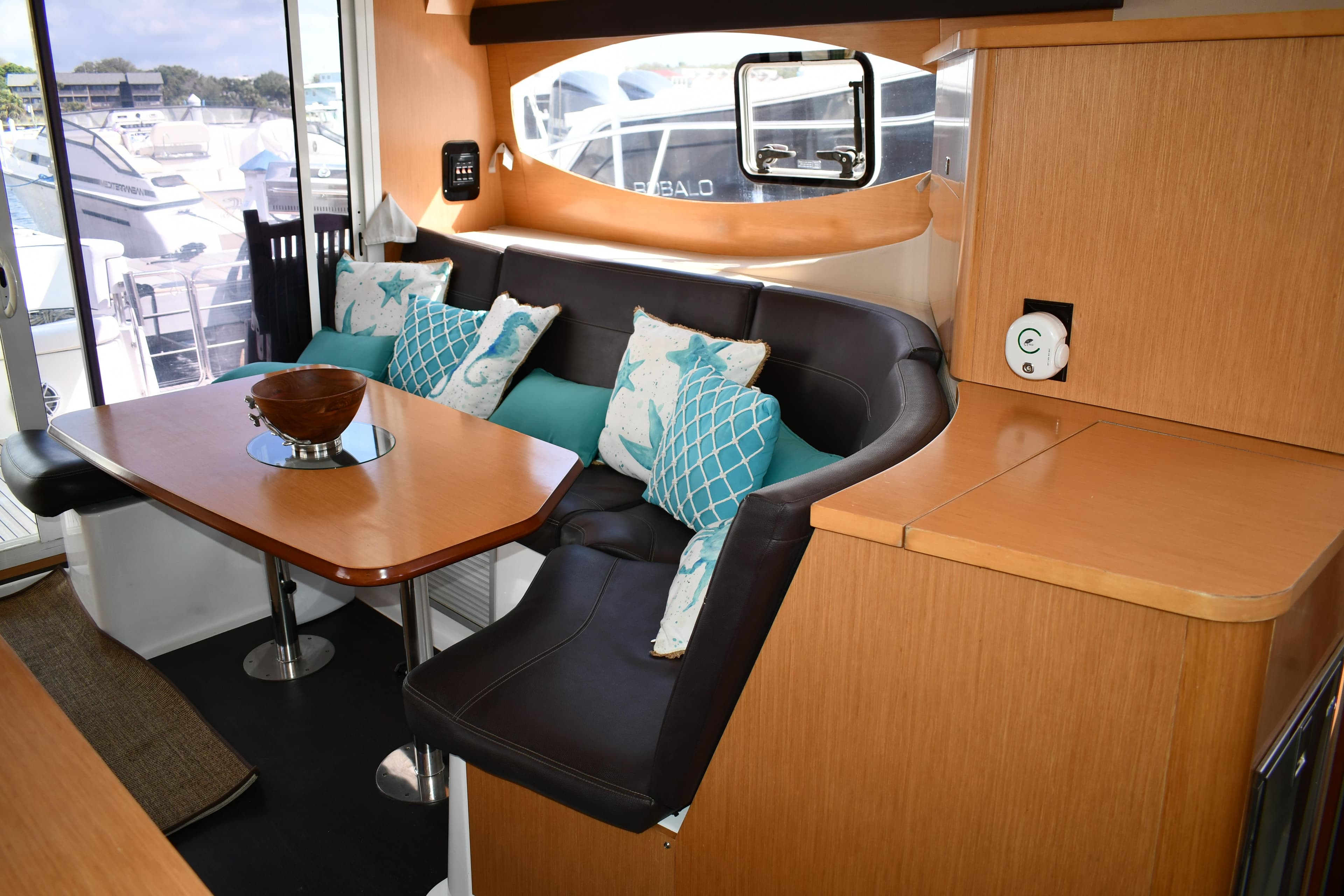 Interior of 2012 Fountaine Pajot 40 catamaran with cozy seating and stylish decor.