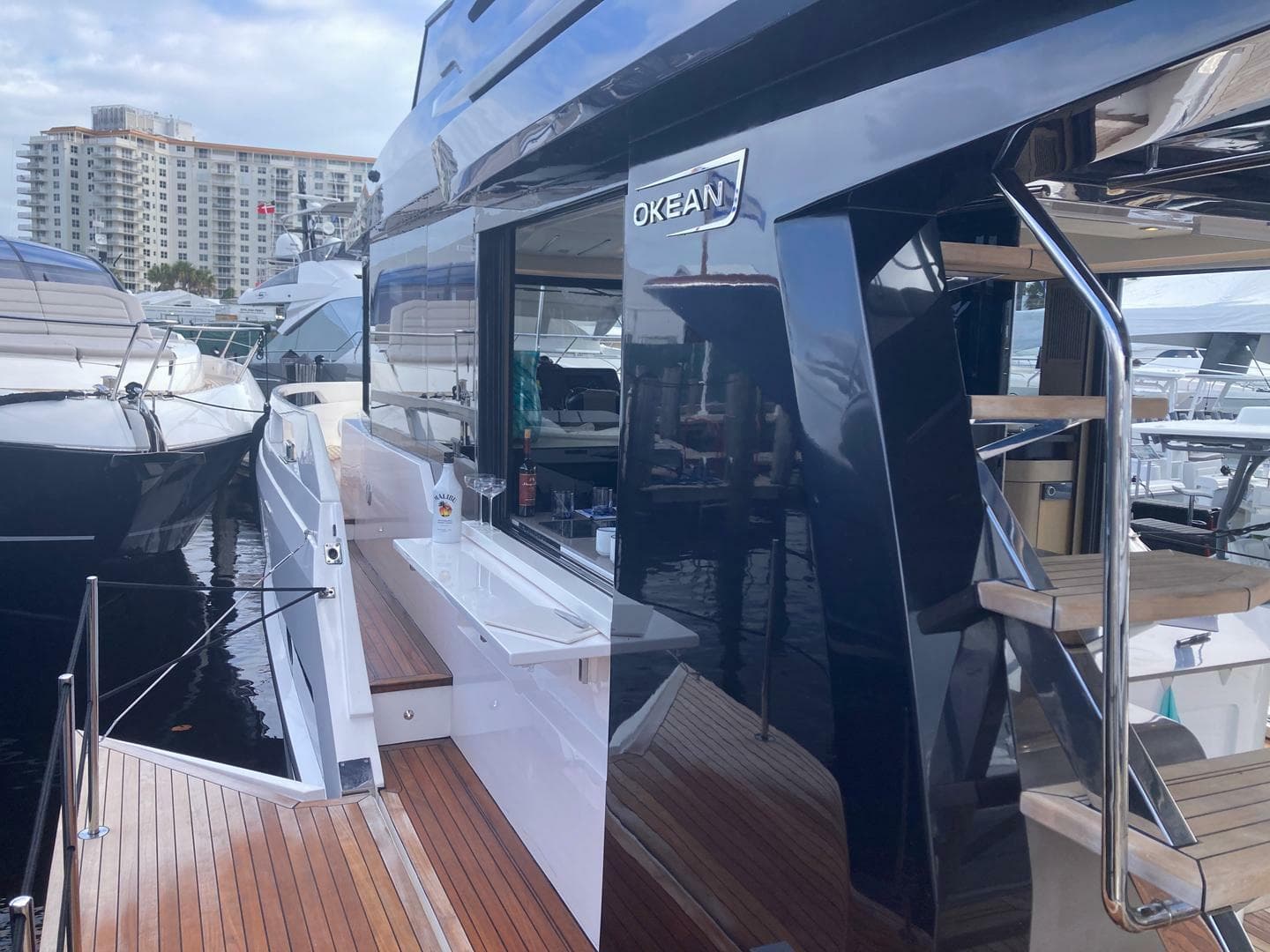 2024 OKEAN 52 yacht with sleek design, docked at marina.