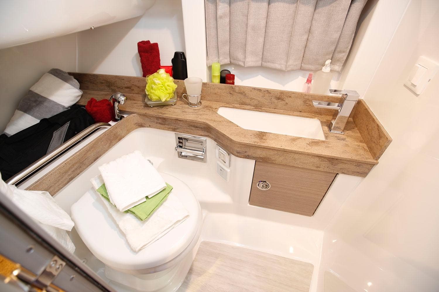 Manufacturer Provided Image: 2026 Formula 350 Crossover Bowrider I/O bathroom with modern sink and compact design.