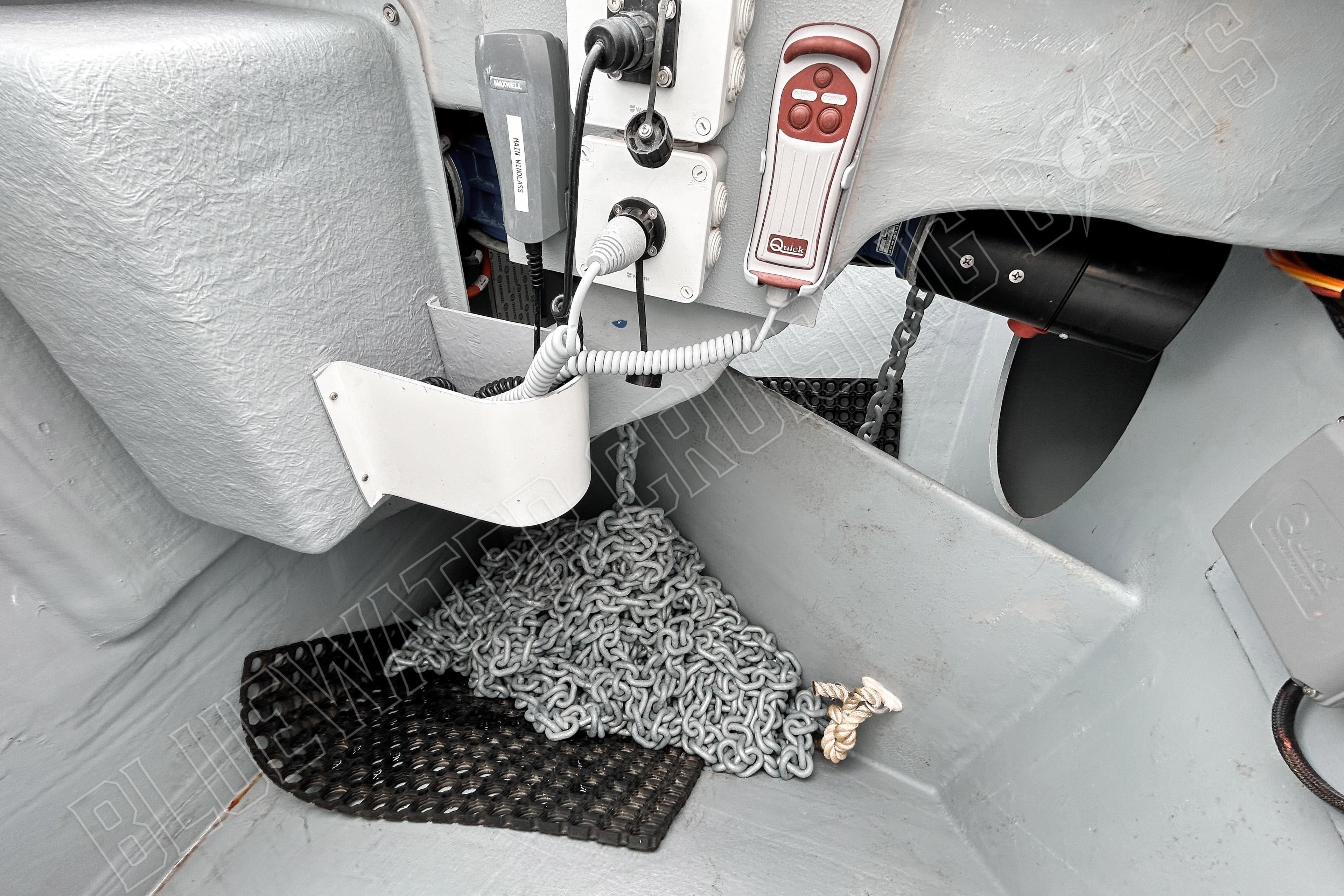 2025 Privilege 580 yacht interior with control panel and anchor chain storage.