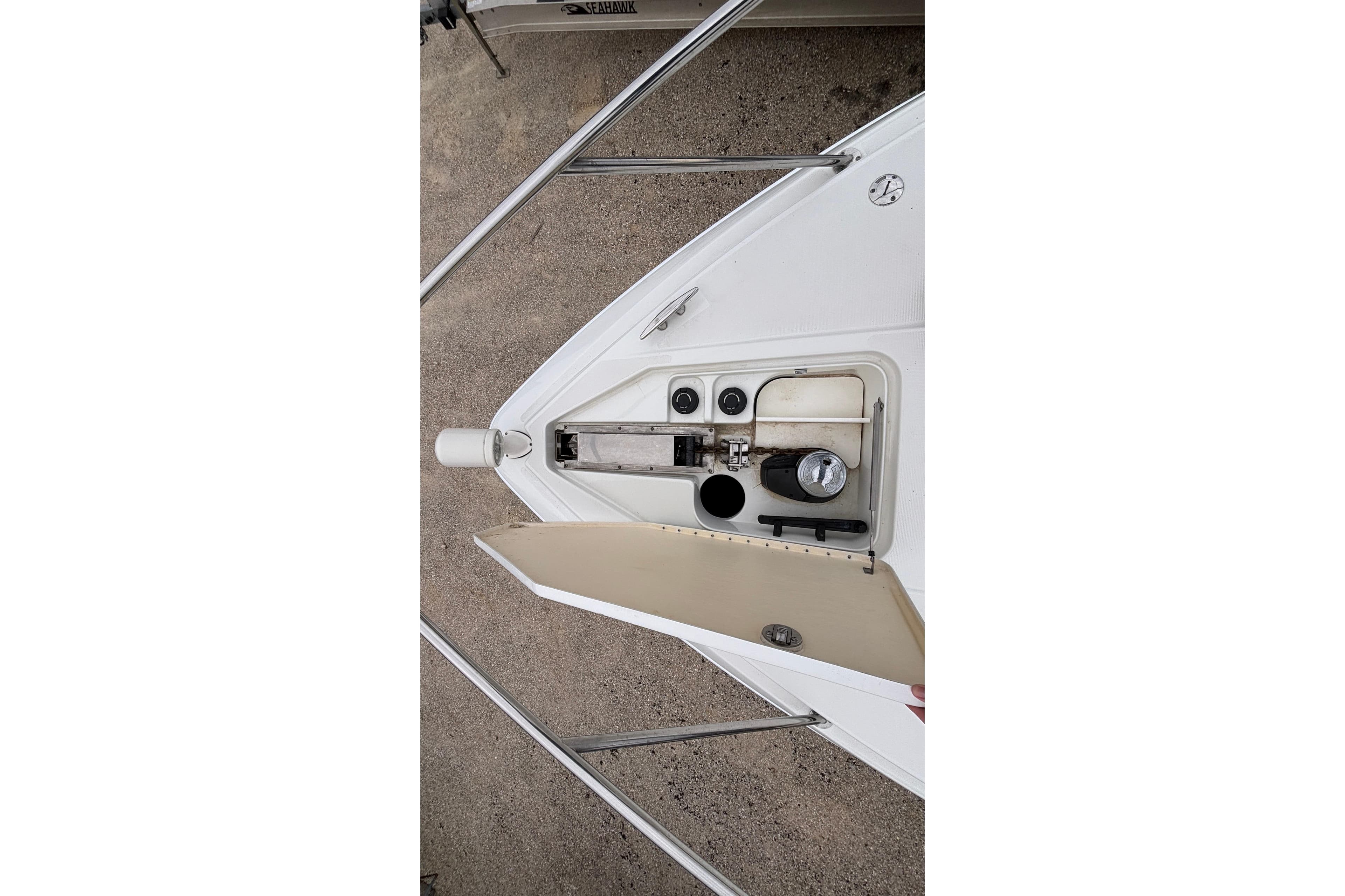 2005 Formula 31 Performance Cruiser bow with open storage compartment.