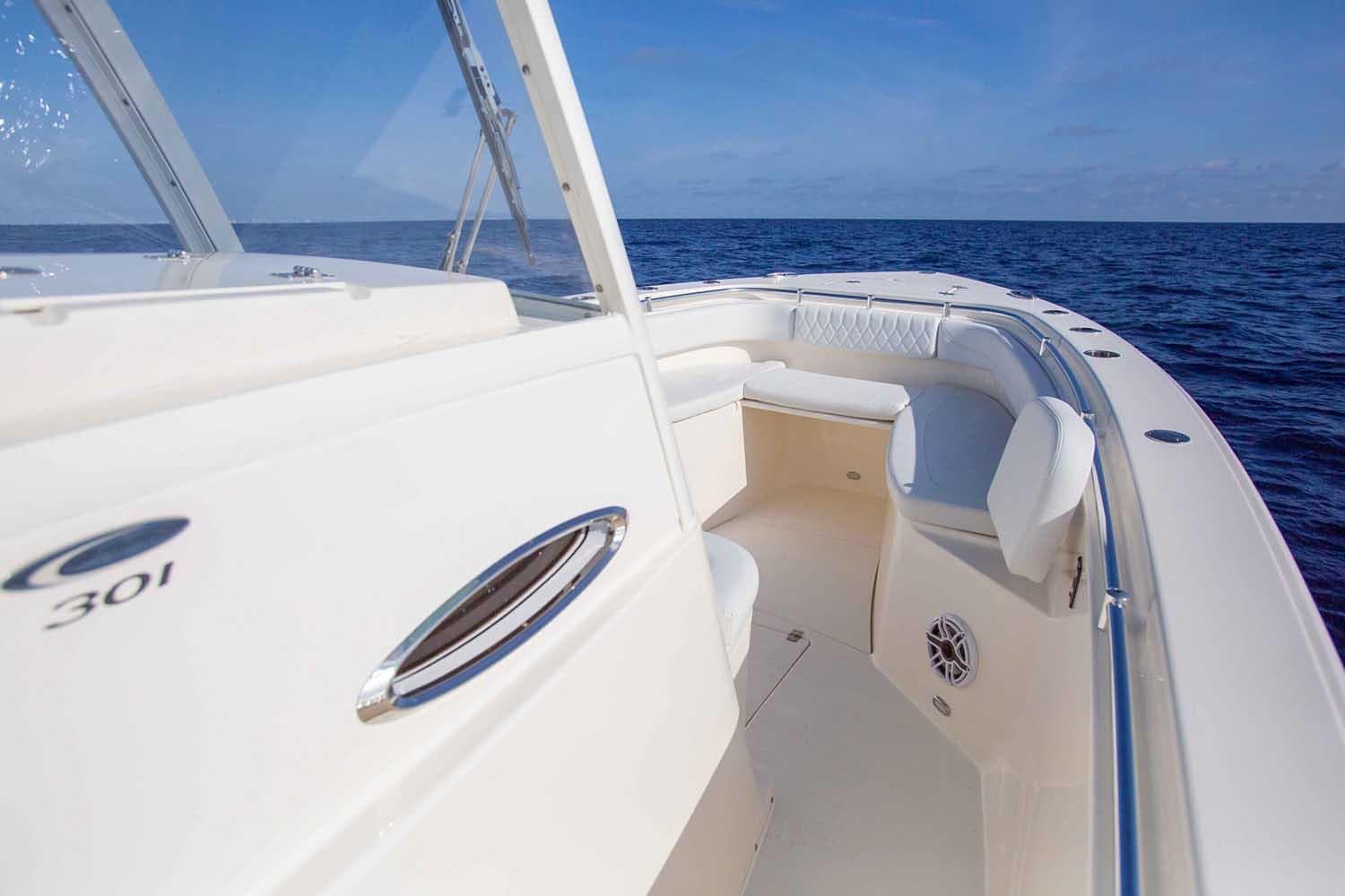 Manufacturer Provided Image: 2023 Cobia 301 Center Console boat on open water.