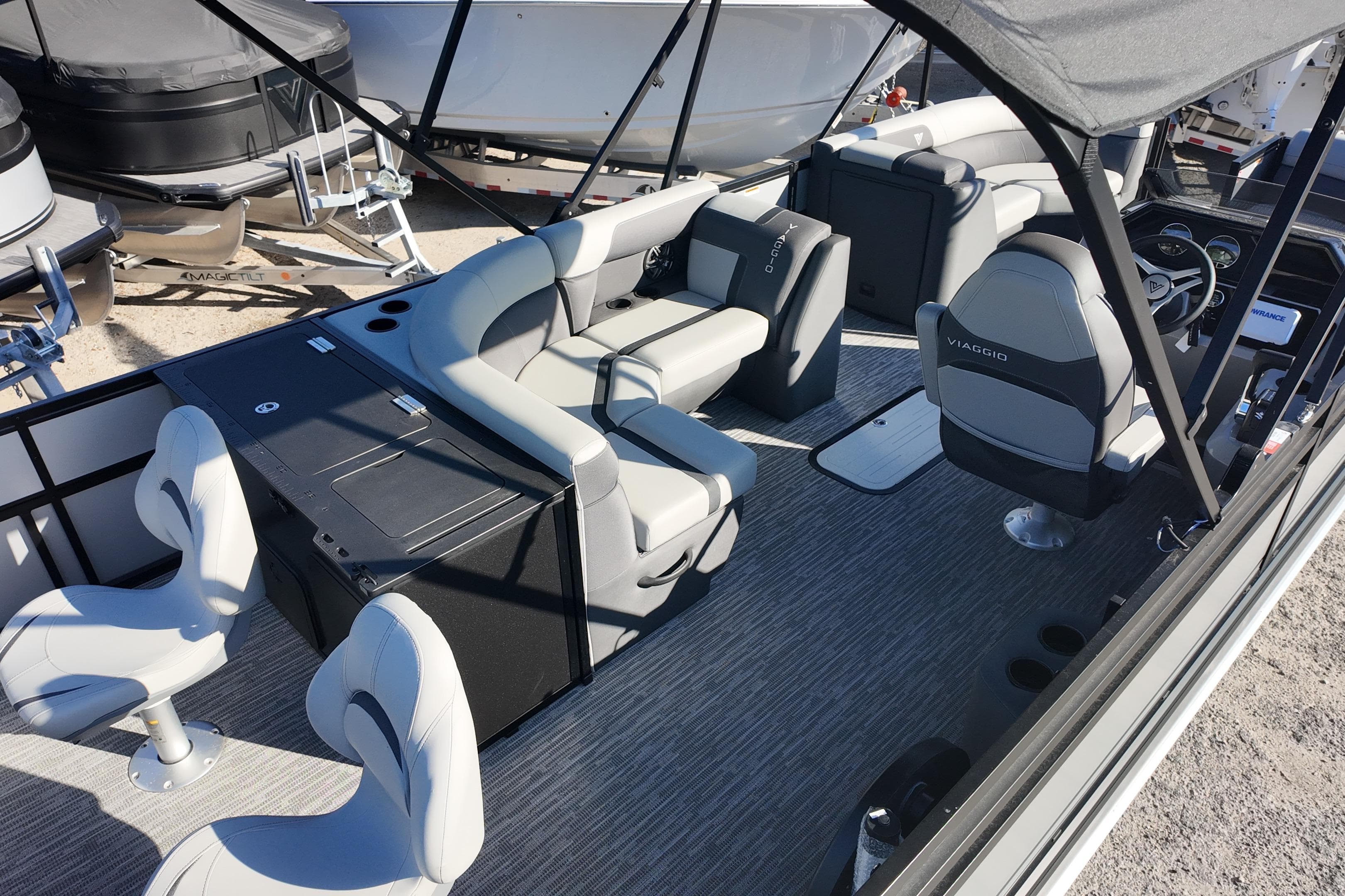 2026 Viaggio Lago X-R 22 pontoon boat interior with modern seating and helm.