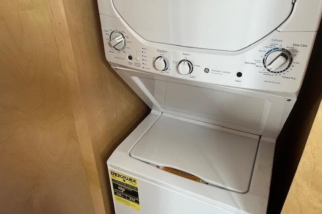 Stacked washer and dryer unit inside a 2003 Fantasy 18x80 Houseboat.