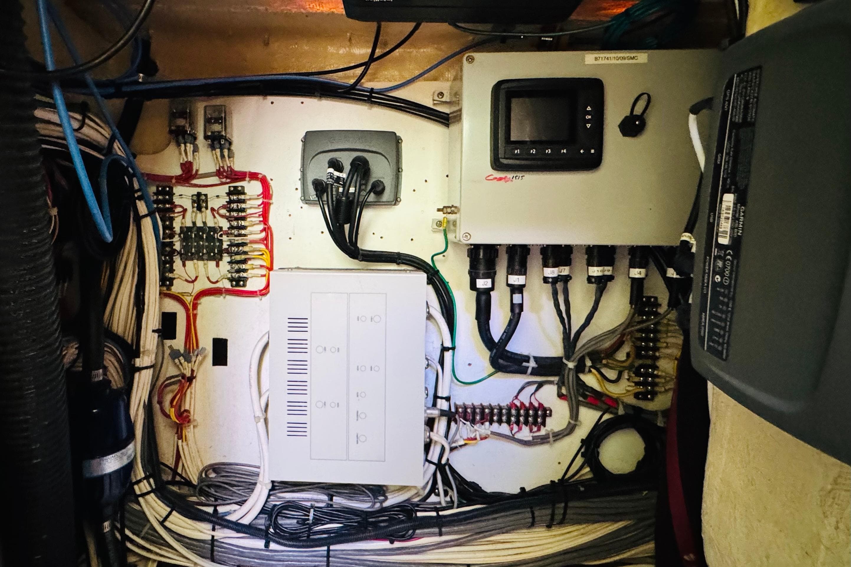 Electrical panel and wiring inside a 2001 Hinckley Talaria 44 yacht.