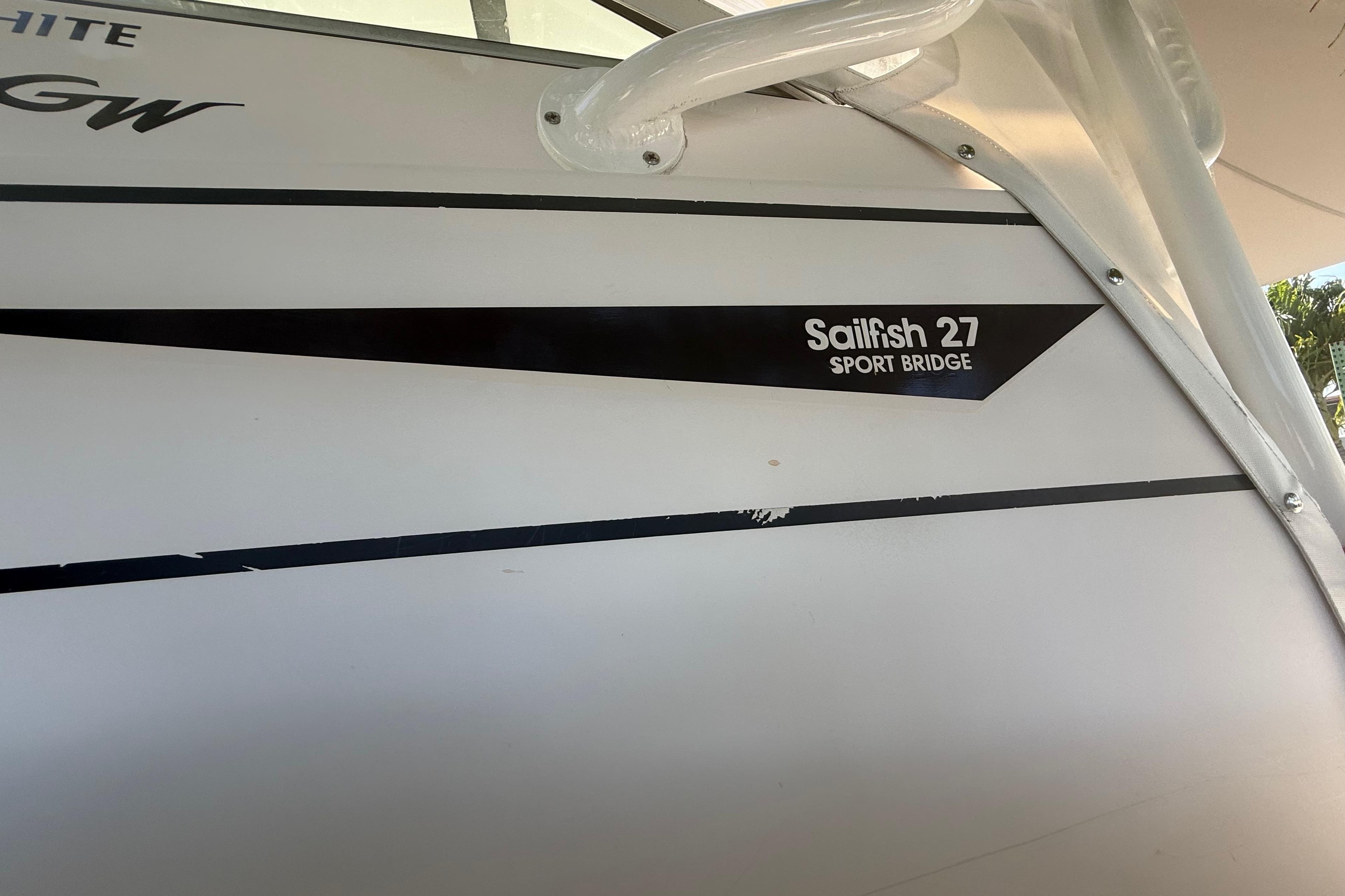1996 Grady-White Sailfish 272 boat, featuring "Sailfish 27 Sport Bridge" branding.