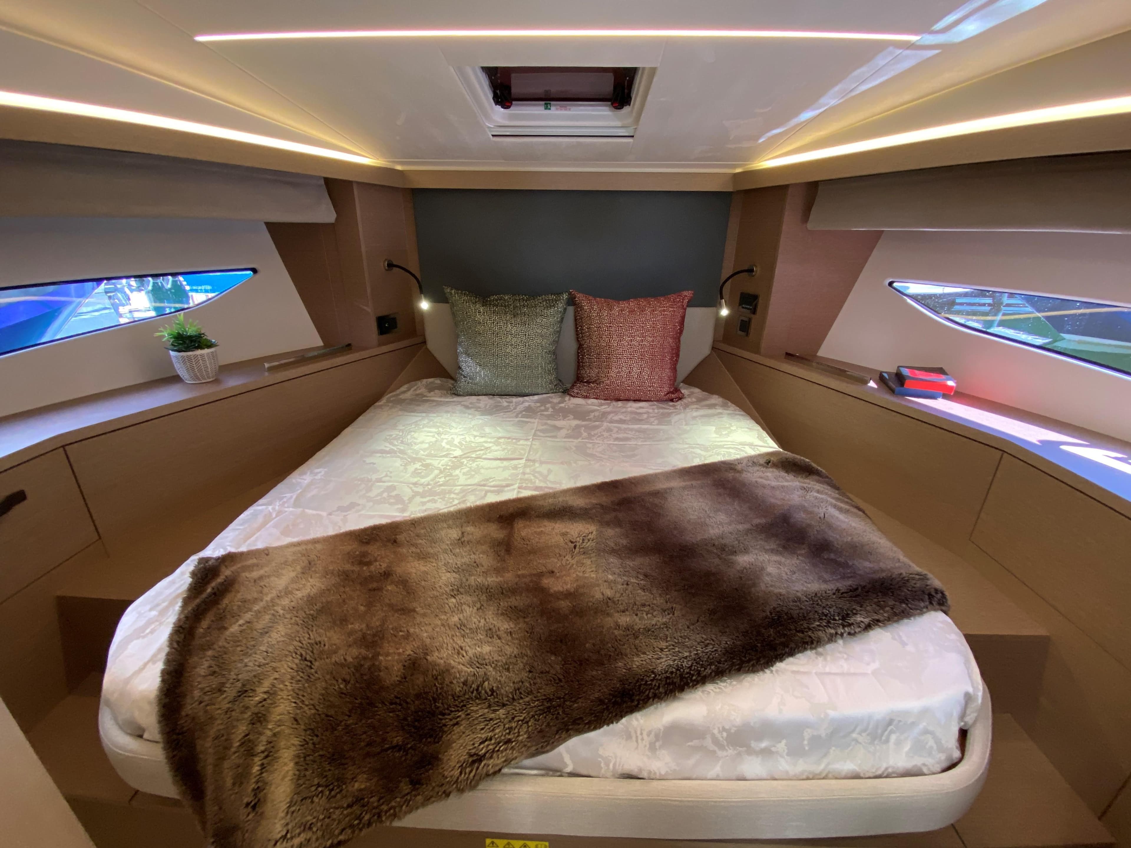 Luxurious bedroom in Prestige 420 yacht, 2023 model.