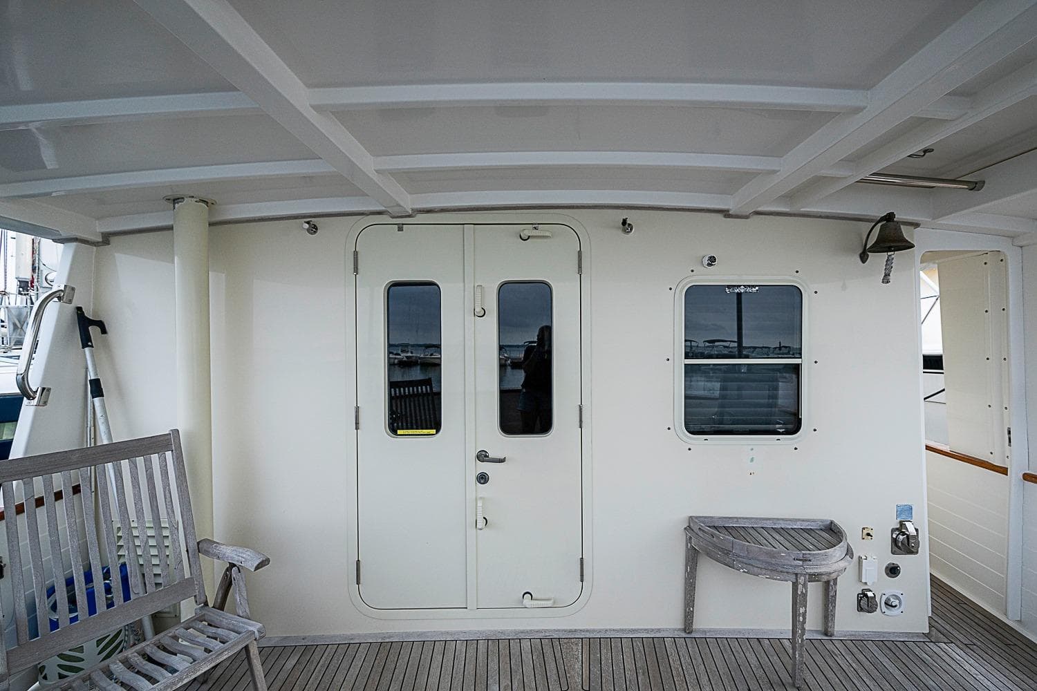 2008 Krogen 48 North Sea yacht deck with seating and door.