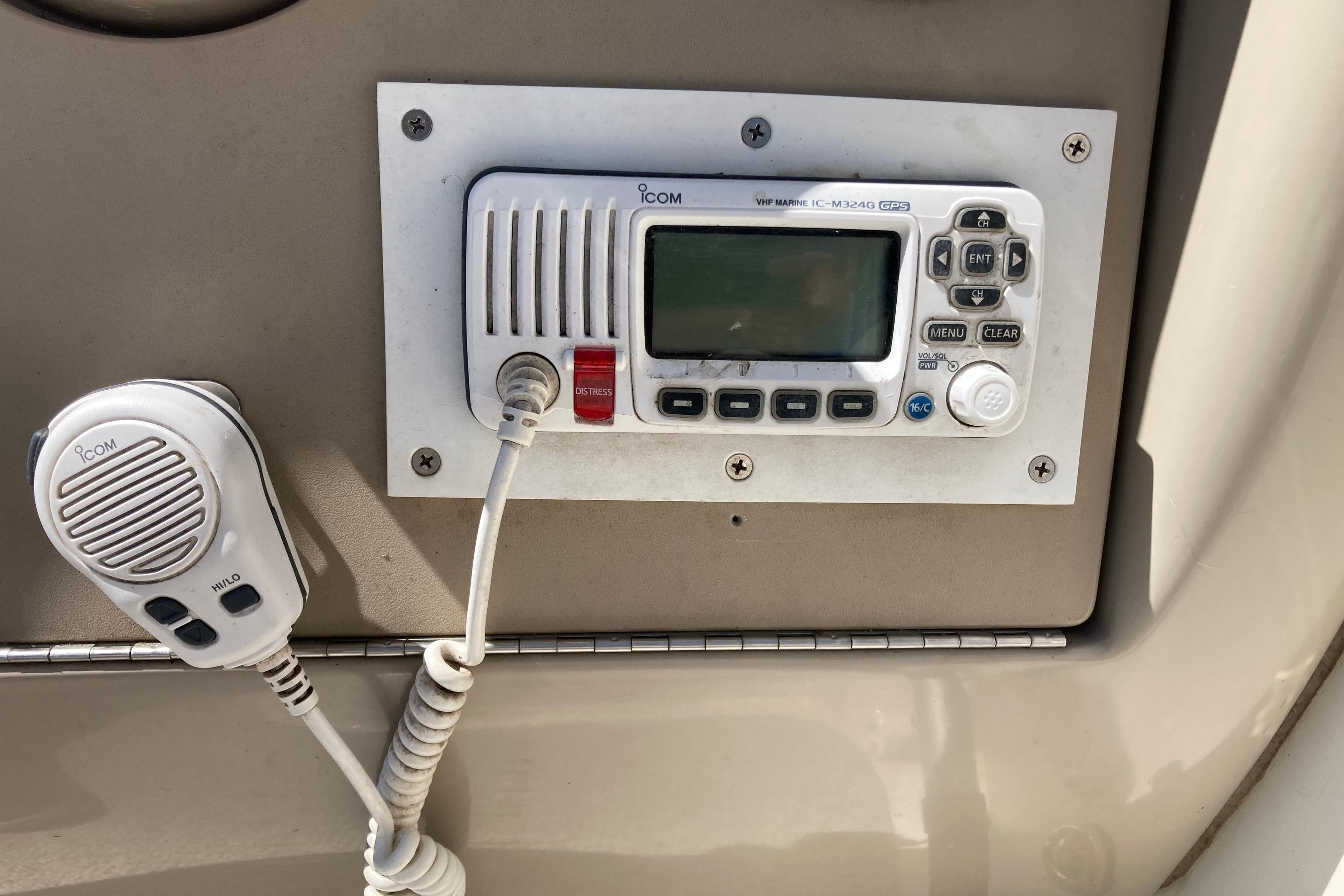 VHF marine radio on 2002 Sea Ray Sundancer 260 boat dashboard.