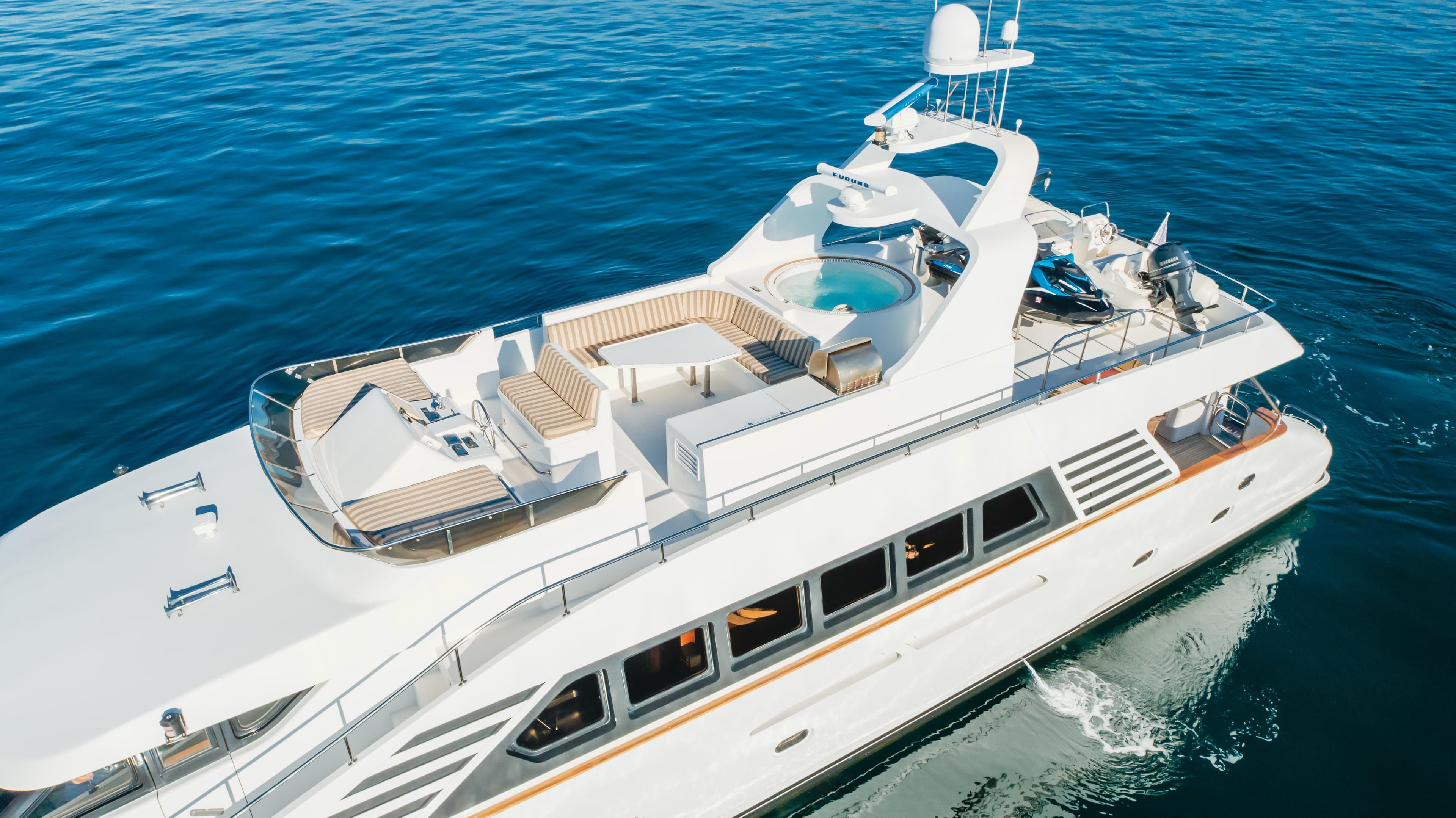 Luxury 2003 TransWorld CUSTOM yacht cruising on open water.