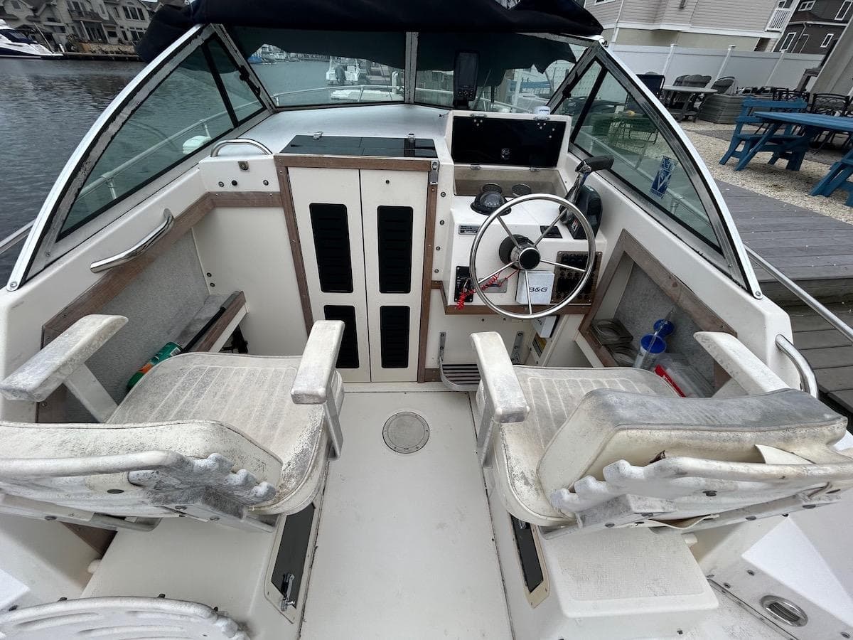 1993 Grady-White 24 Explorer boat interior with dual seats and steering wheel.