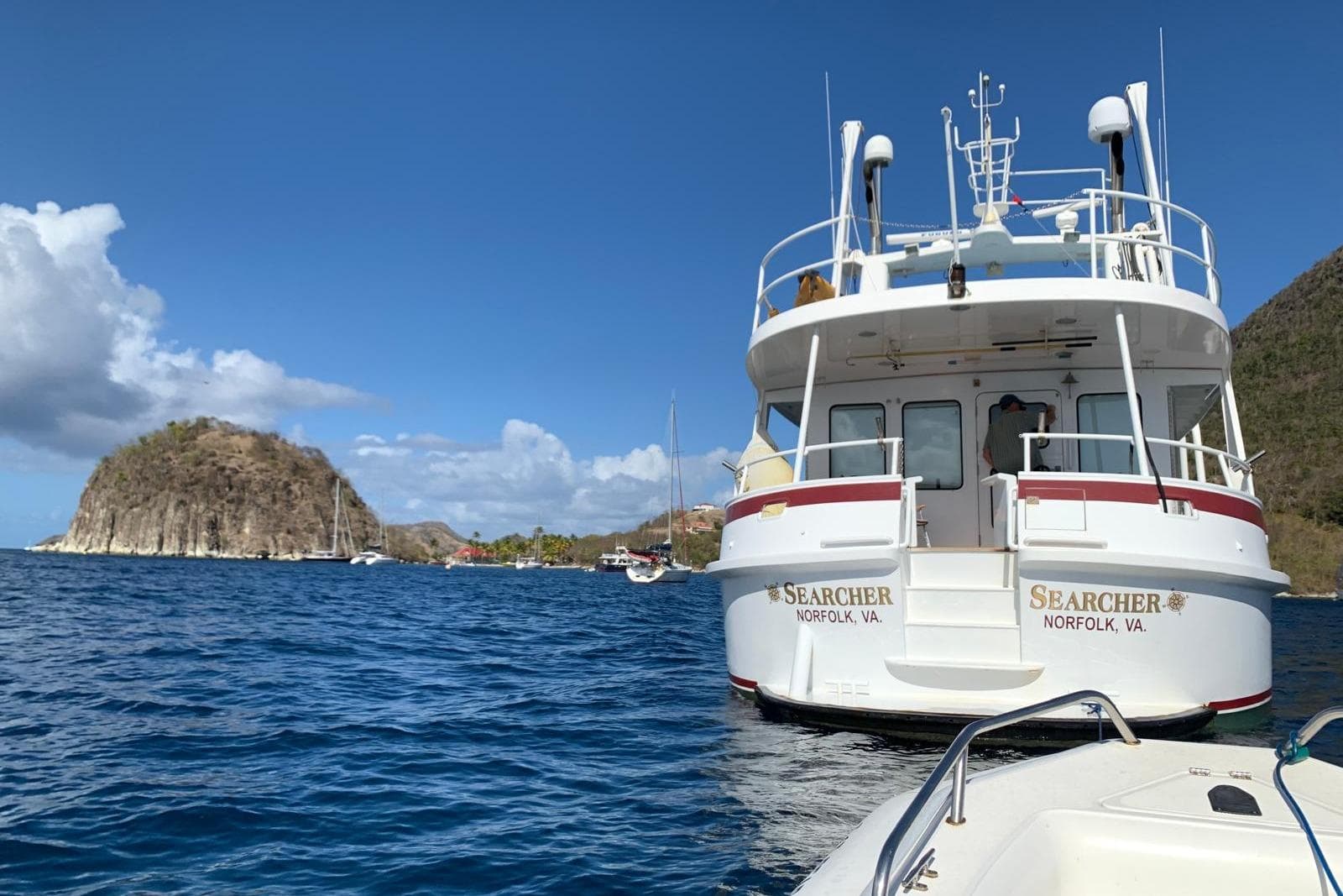 Jones-Goodell 65’ Long Range Trawler, 1992, anchored in scenic coastal waters.