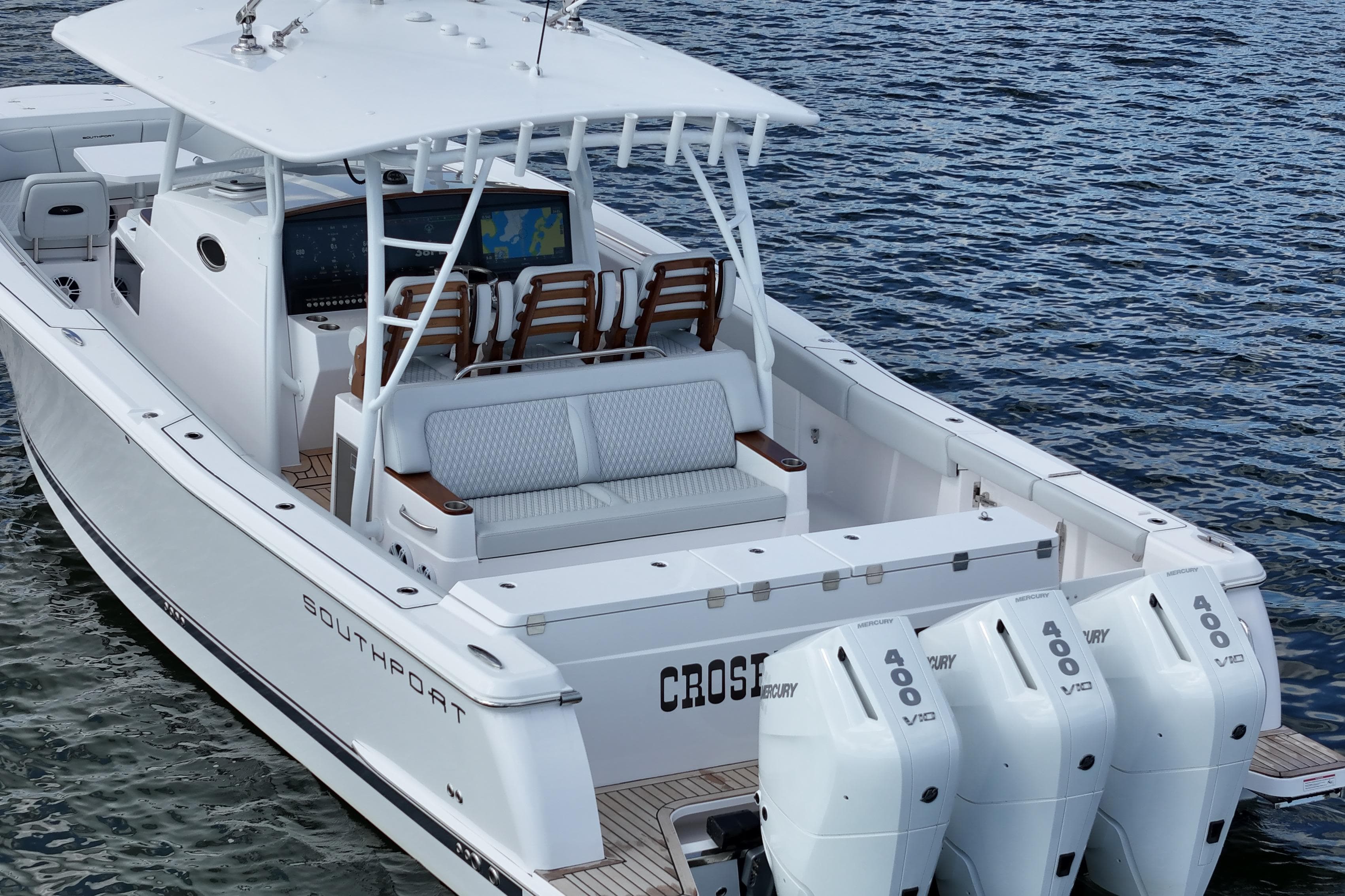 2025 Southport 38 FE boat with triple Mercury 400 engines on water.
