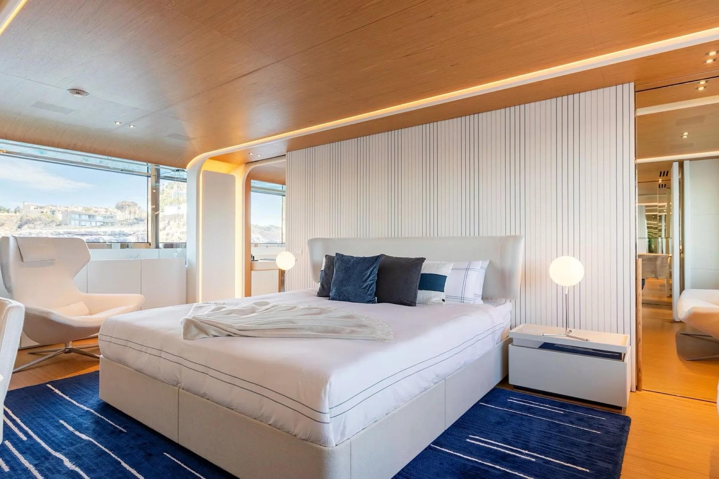Luxurious bedroom interior on 2022 Benetti Motopanfilo 37 yacht, featuring modern design and elegant furnishings.