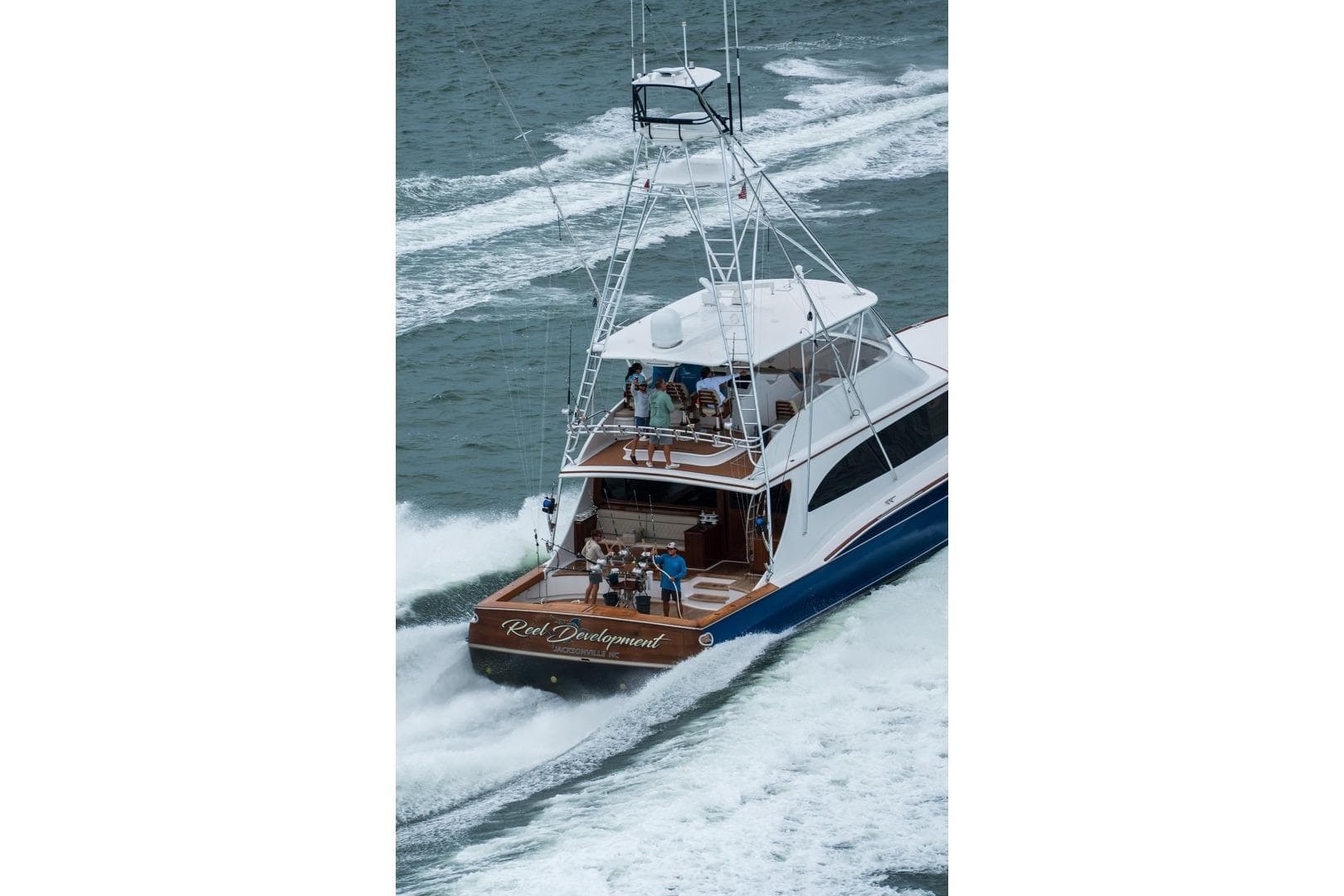 2020 Jarrett Bay 84 yacht cruising on open water, showcasing sleek design and powerful performance.