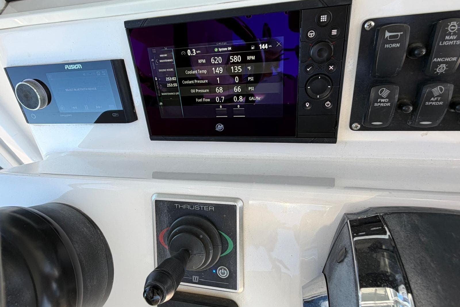 Control panel of a 2021 Southport 30 FE boat with digital displays and switches.
