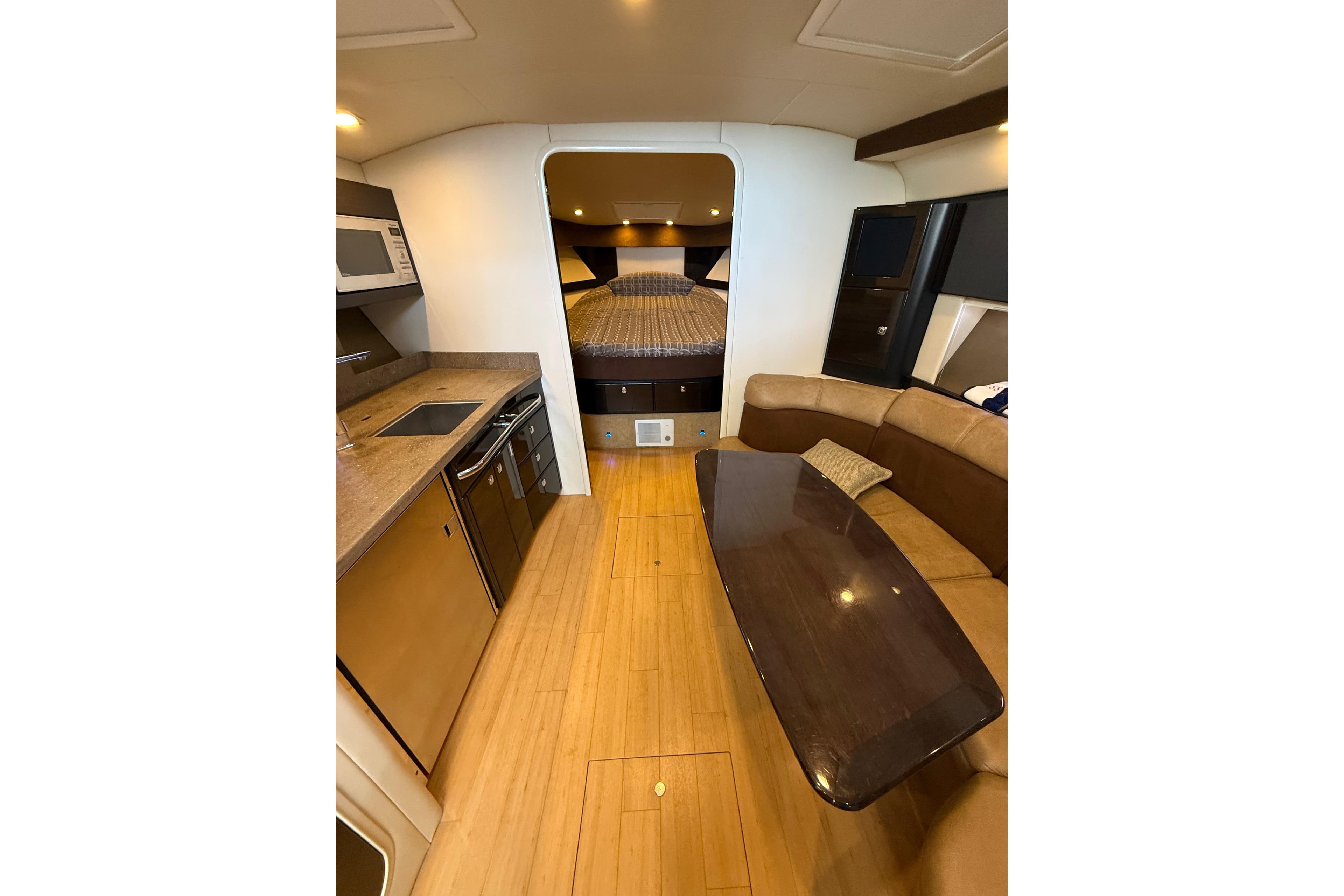 Interior of 2014 Formula 37 Performance Cruiser with kitchen and seating area.