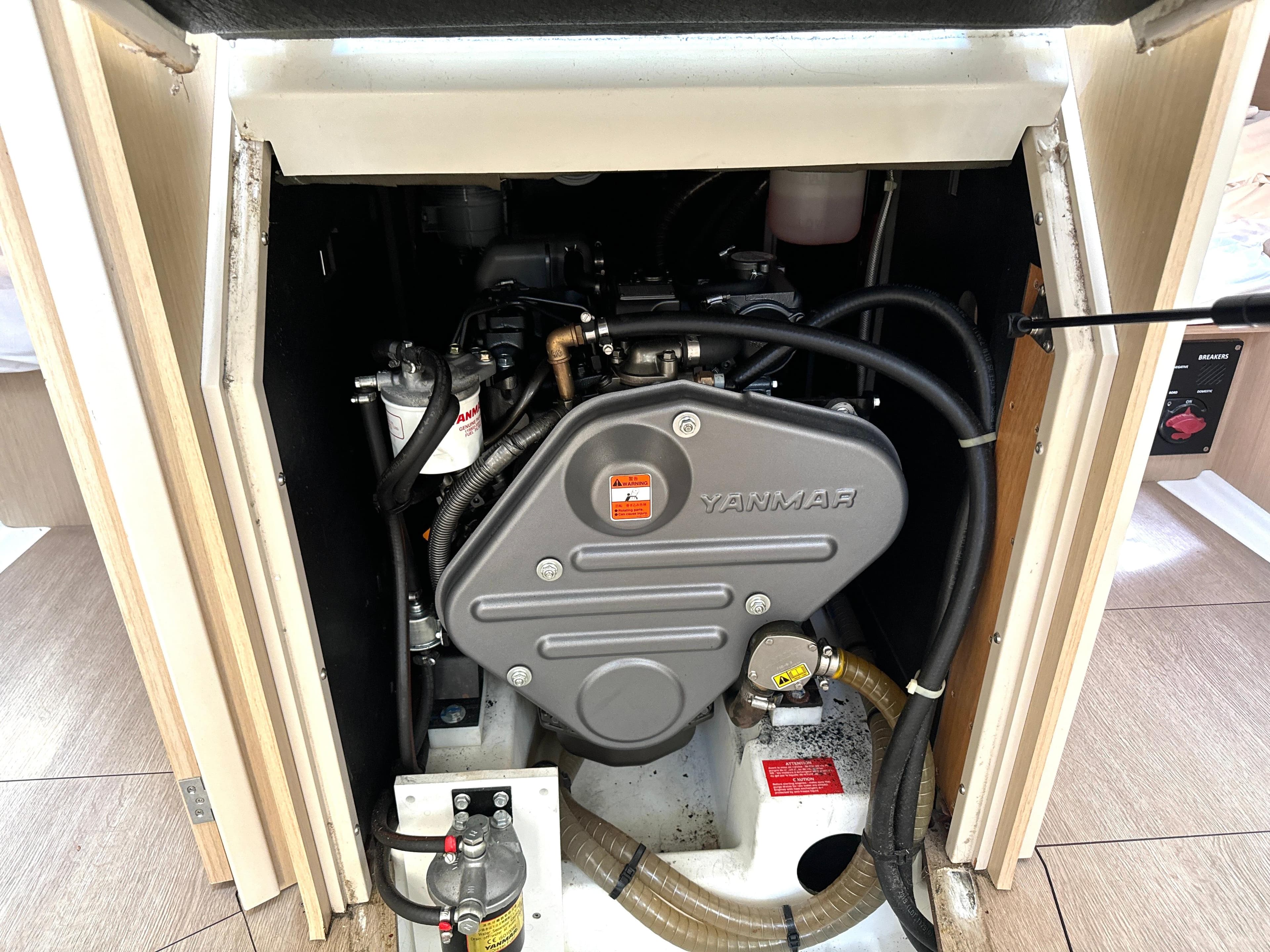 Yanmar engine in a 2021 Beneteau Oceanis 38.1 sailboat, showcasing compact design and installation.
