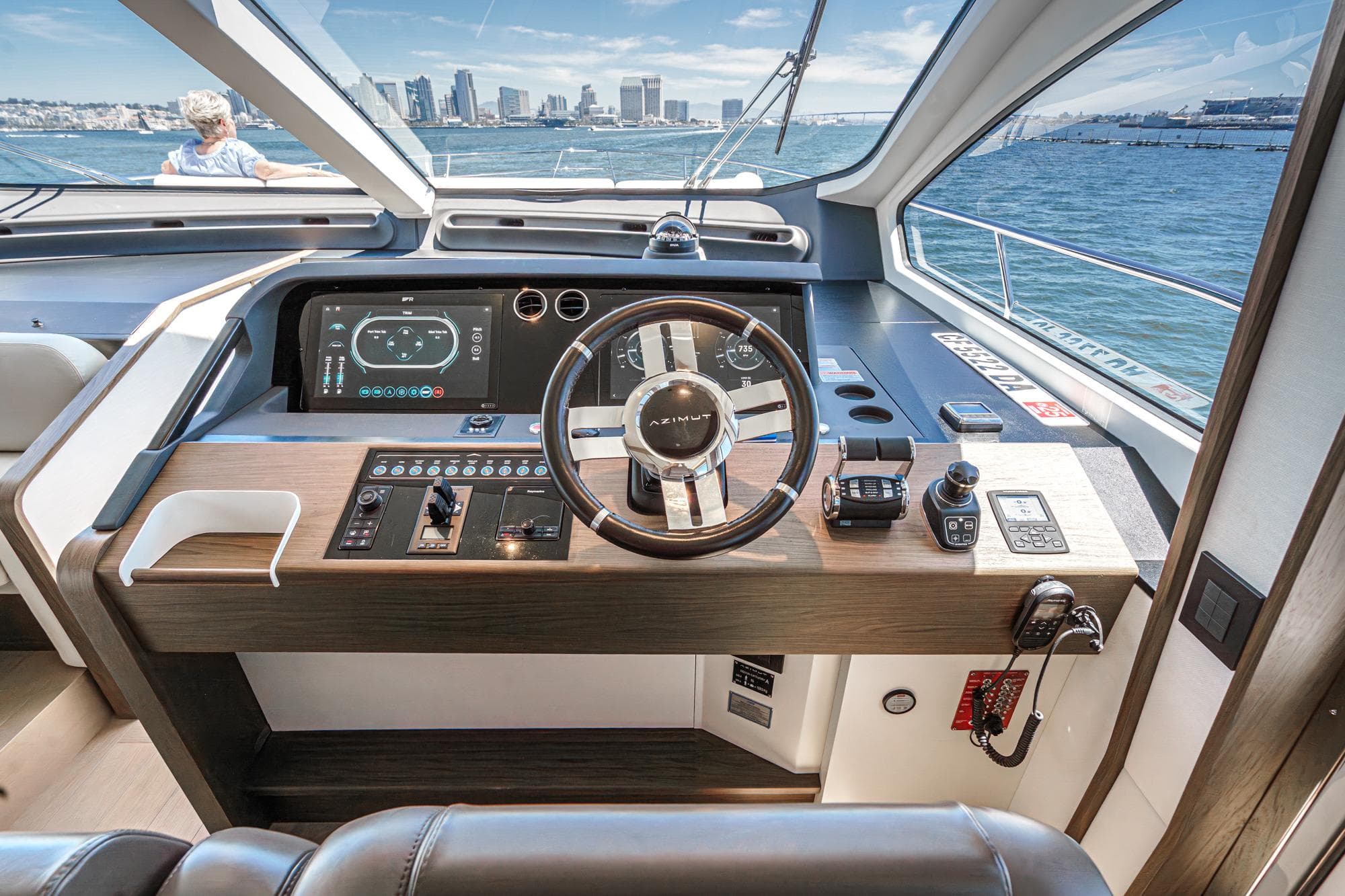 Helm of 2026 Azimut Fly 72 yacht with modern controls and ocean view.