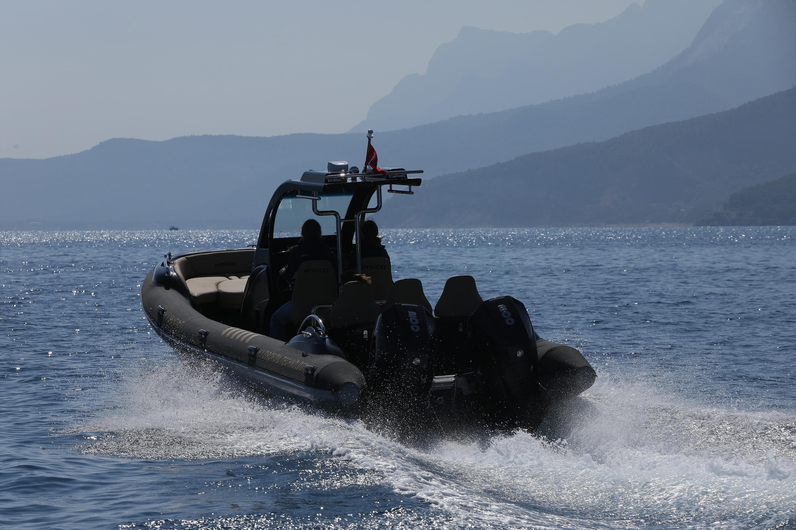 2026 Bering Marine 28 RIB Center Console cruising on open water.