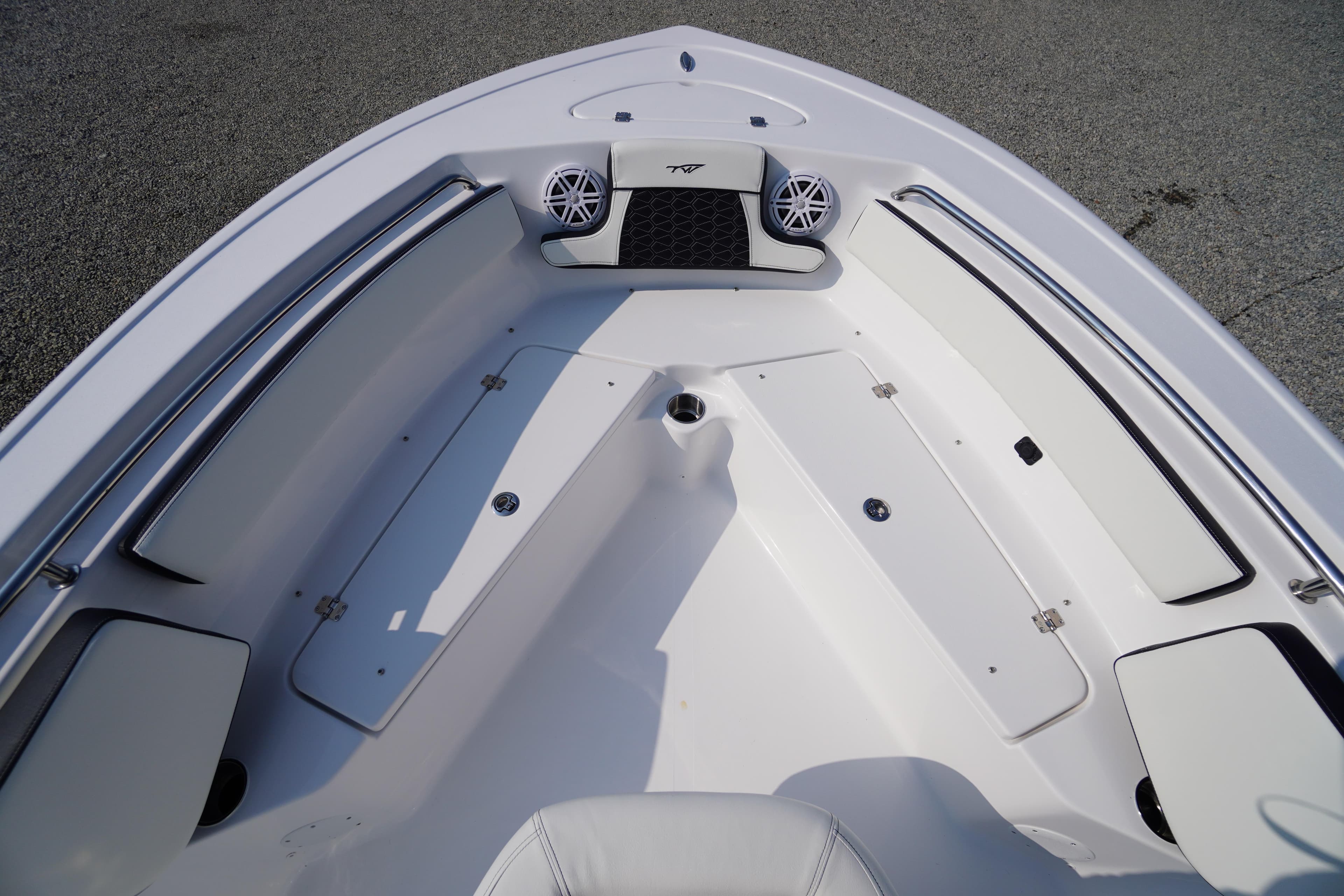 2026 Tidewater 210 CC Adventure boat interior with seating and storage compartments.