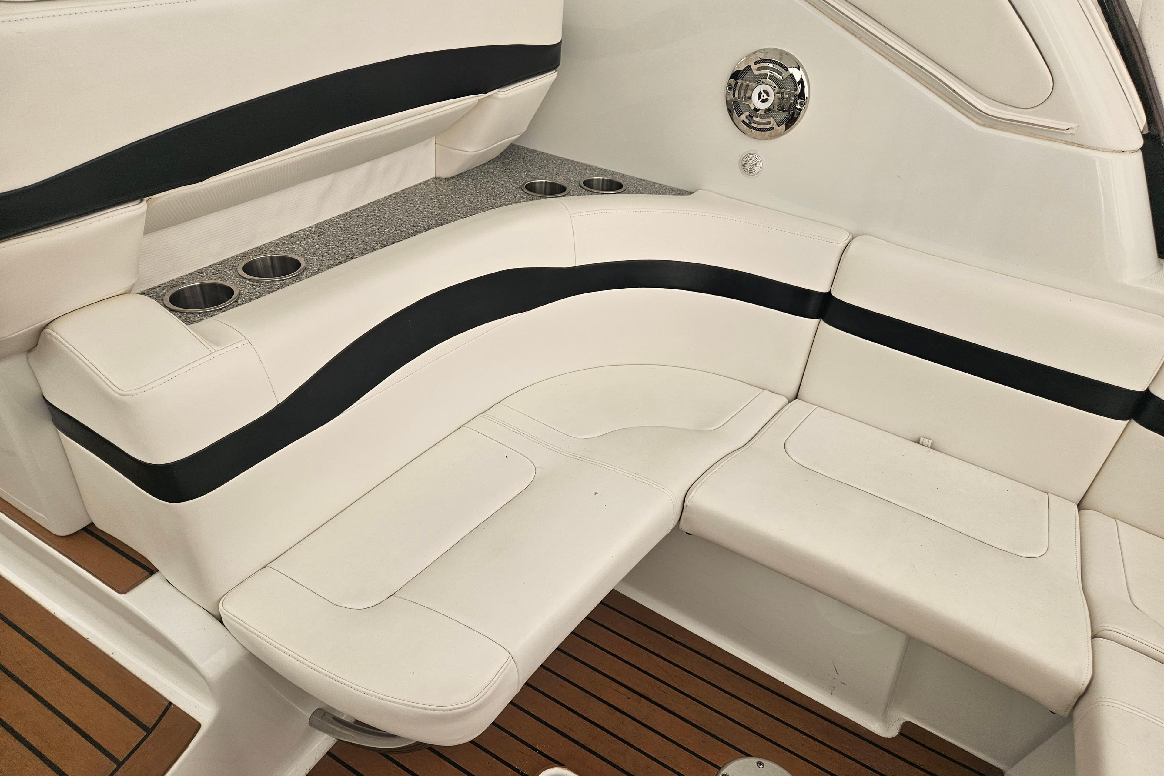 2010 Formula 34 Performance Cruiser interior seating with cup holders and speaker.