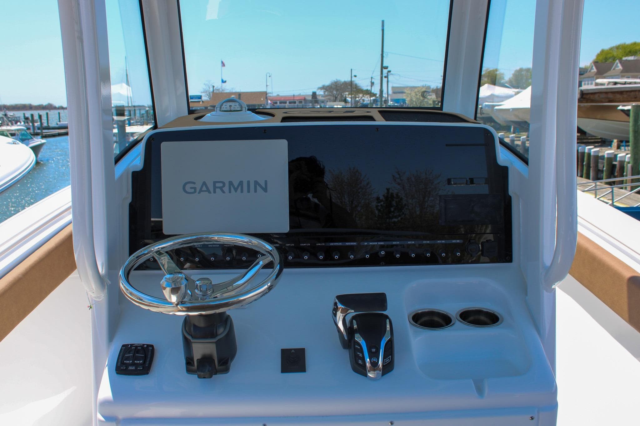 Helm of 2026 Sea Hunt Ultra 255 SE with Garmin navigation system and controls.