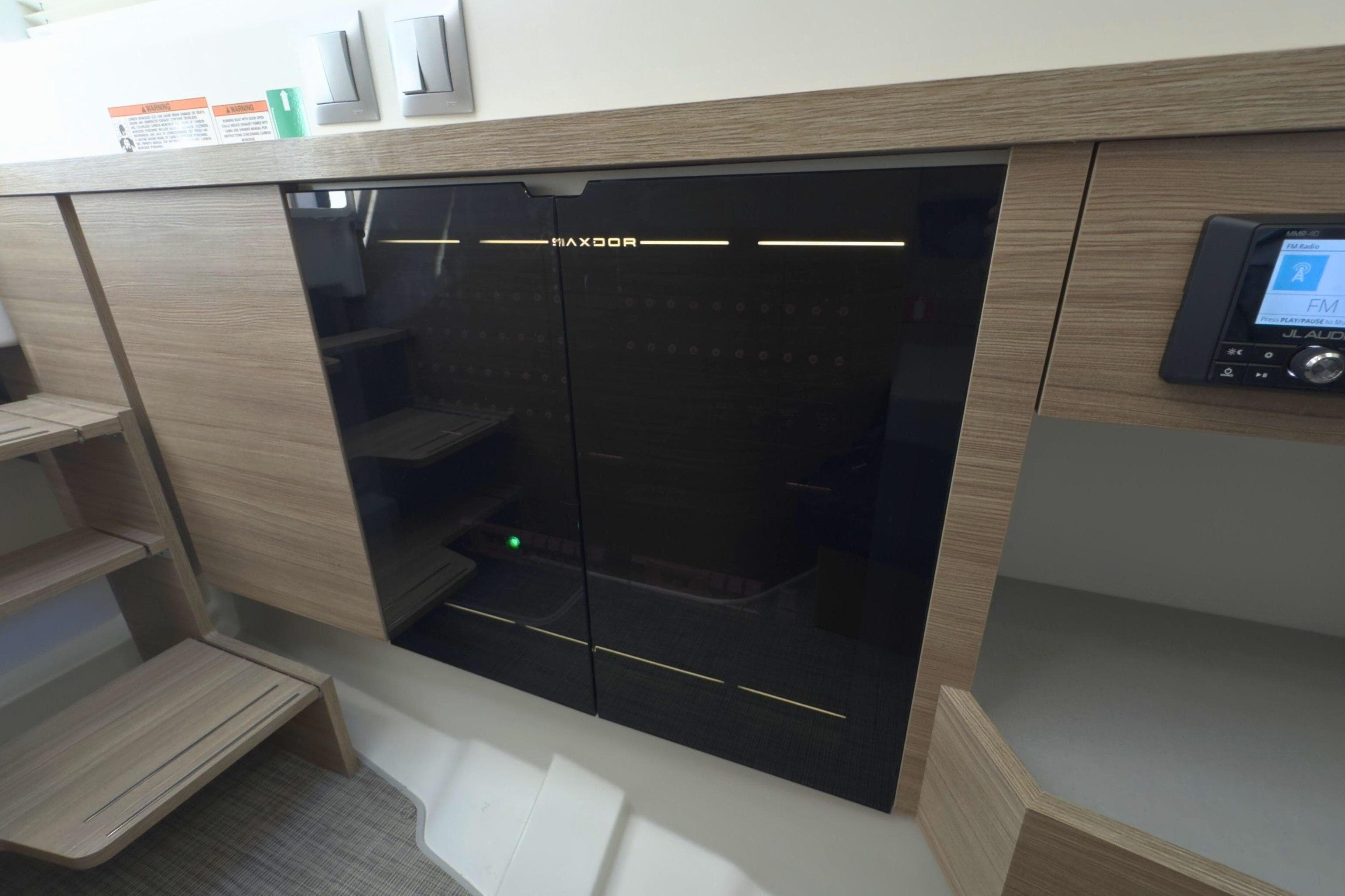 Interior of 2025 Saxdor 400 GTO, featuring sleek cabinetry and modern design elements.
