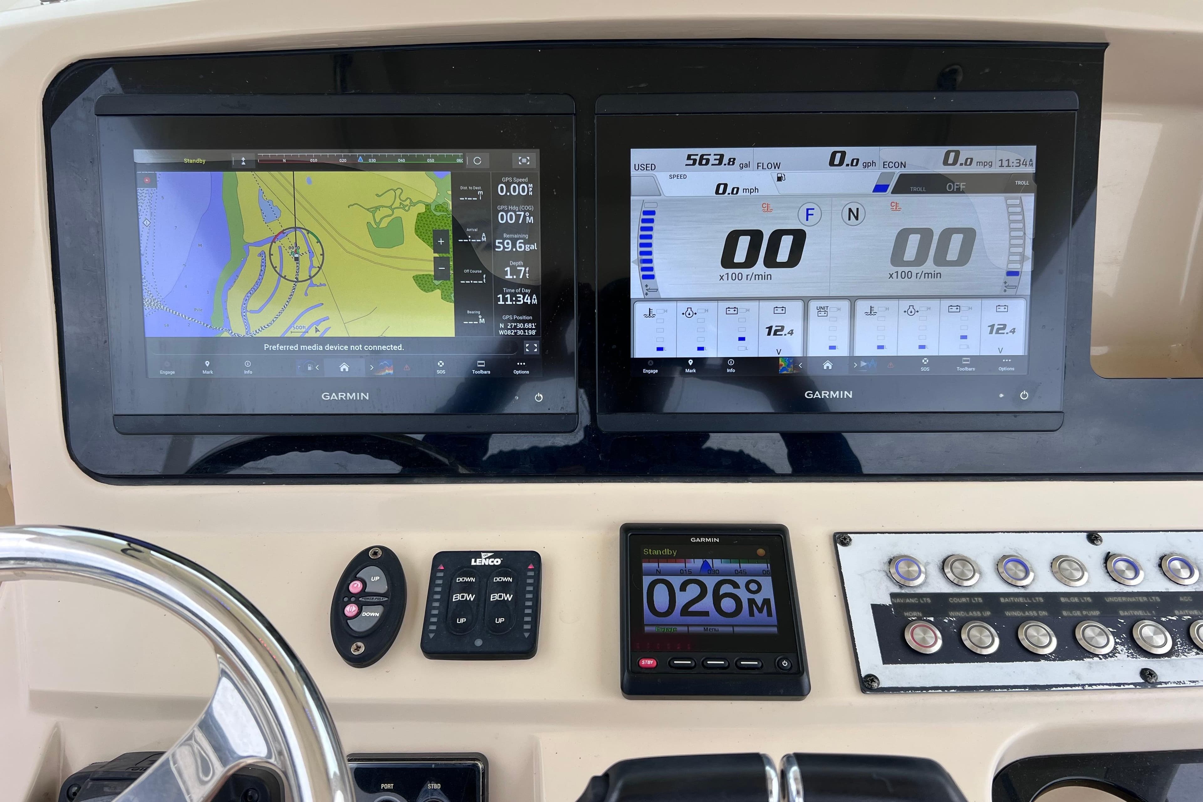 2019 Scout 255 LXF dashboard with Garmin navigation and control displays.
