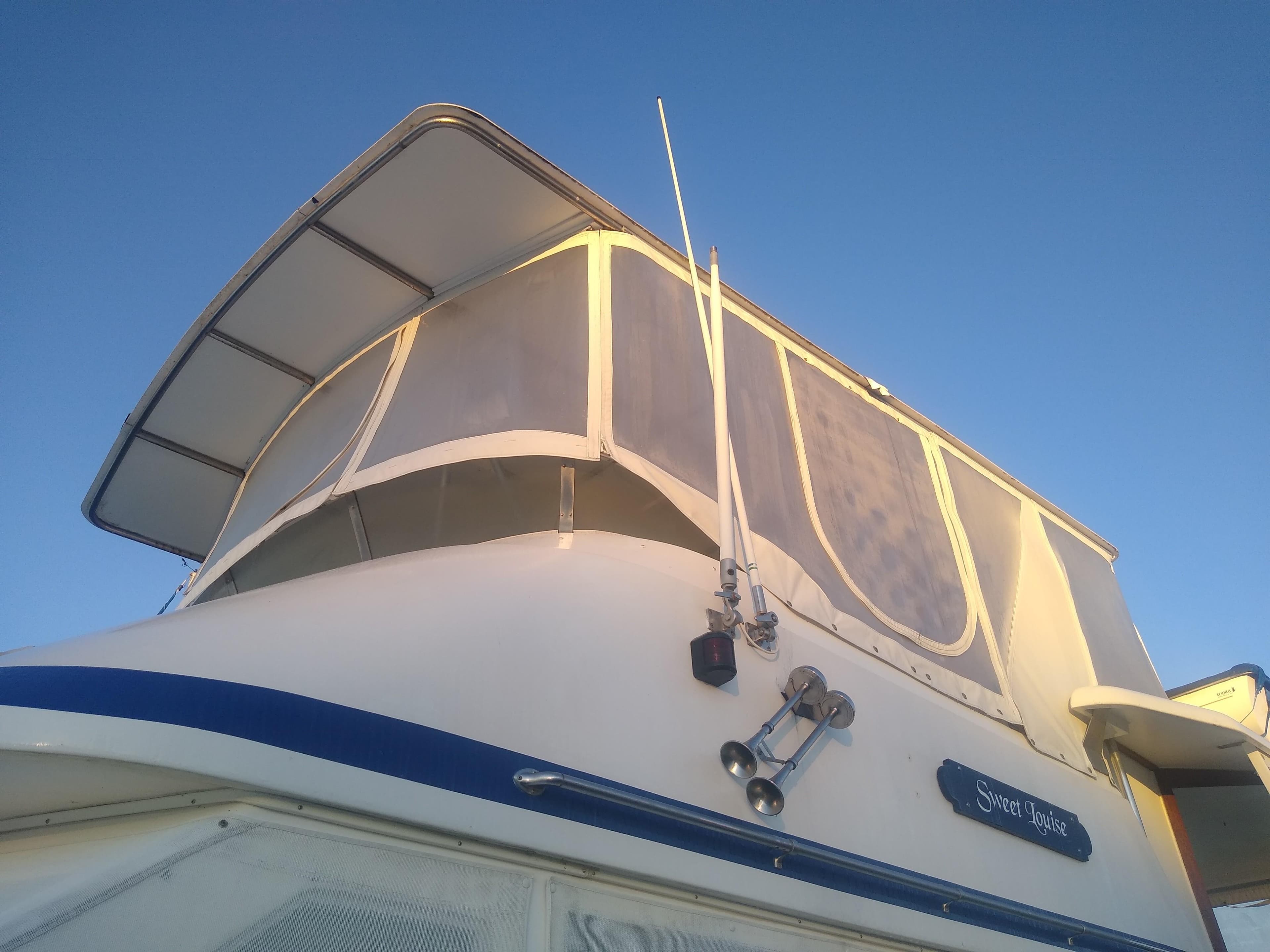 1987 Jefferson 42 Sundeck Motor Yacht exterior view with clear skies.