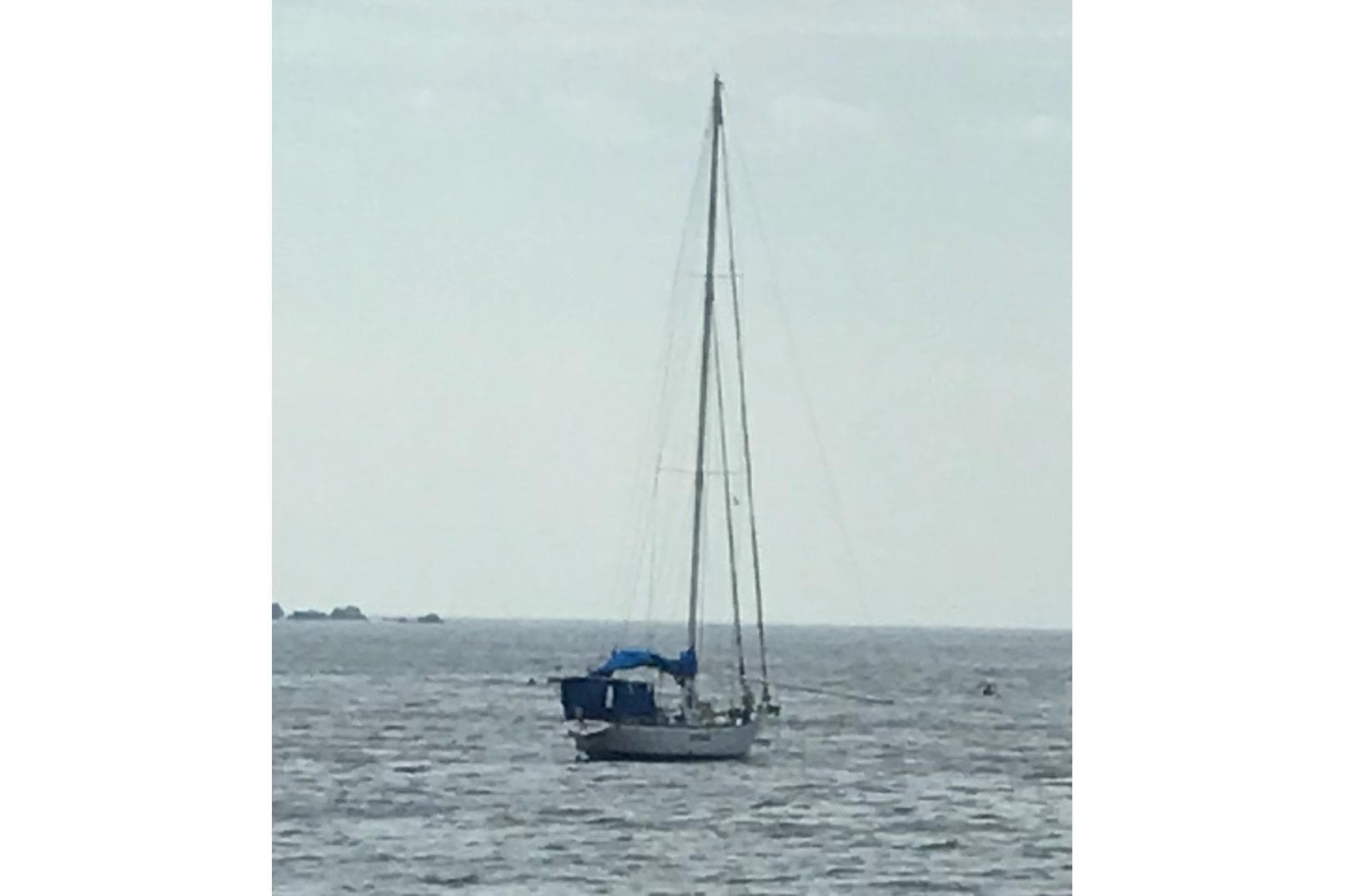 Sailboat on open water, Columbia 52 model, 1975 vintage.