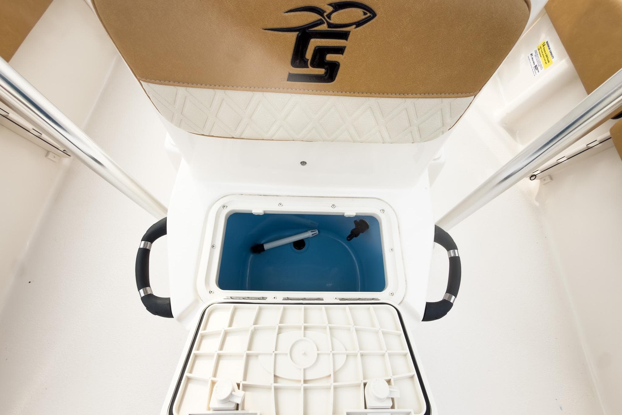 2025 Carolina Skiff 21 Ultra Elite boat interior with storage compartment open.